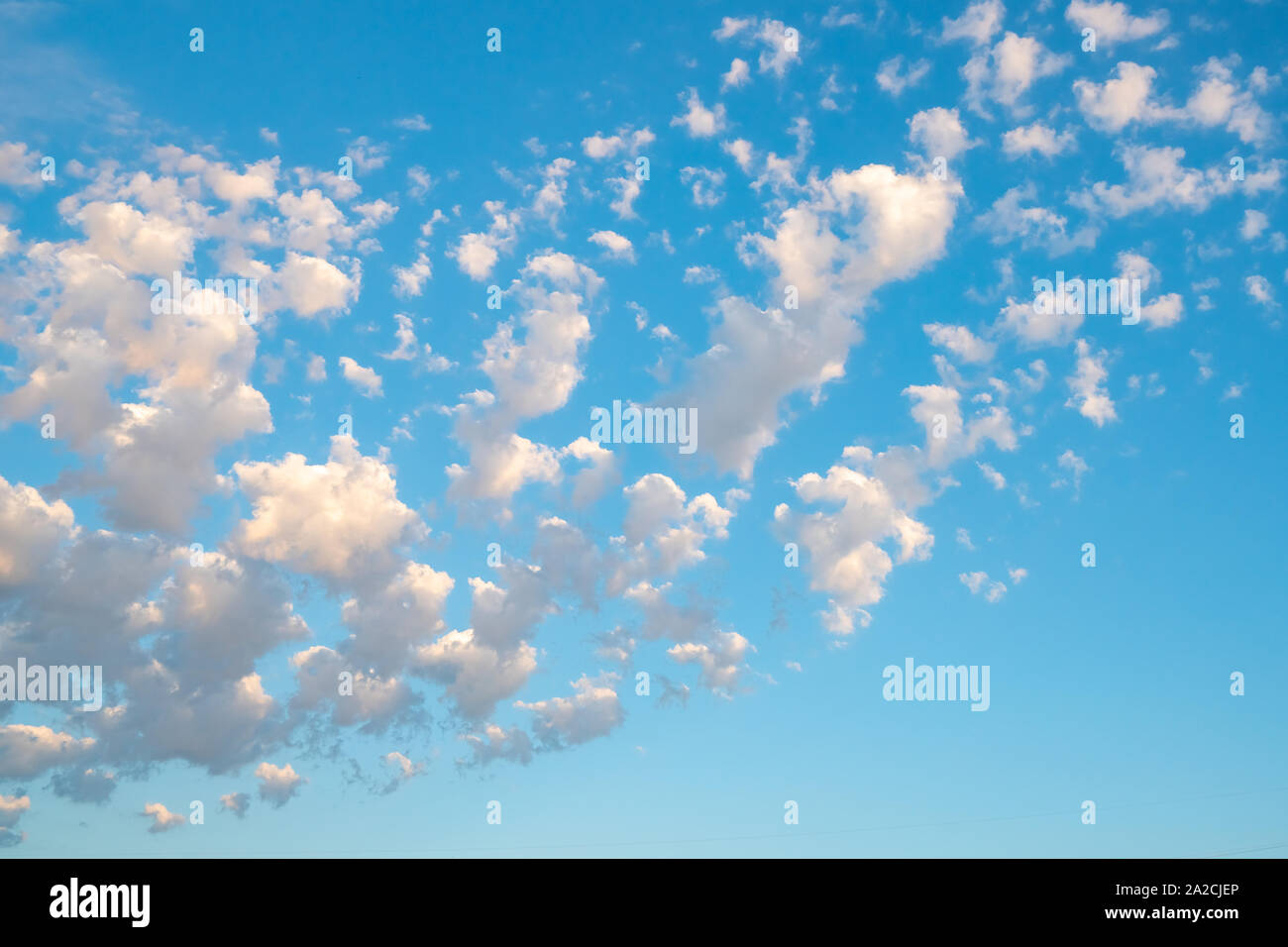 blue sky background with a tiny clouds. Background Stock Photo - Alamy