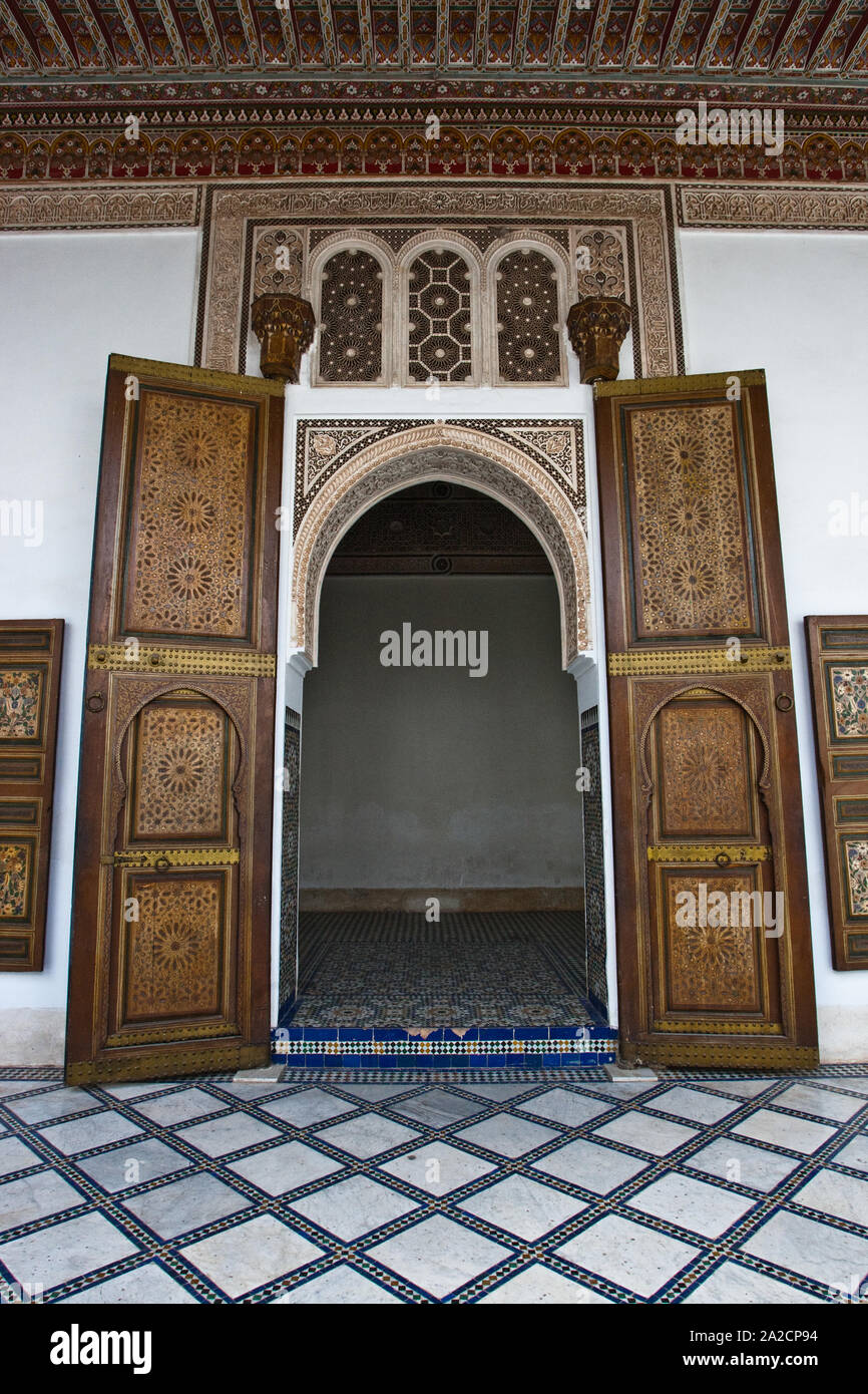 Interior of Marrakech's El Bahia palace, an important landmark of Moroccan architecture.Interior door and paved mosaic floor. Stock Photo