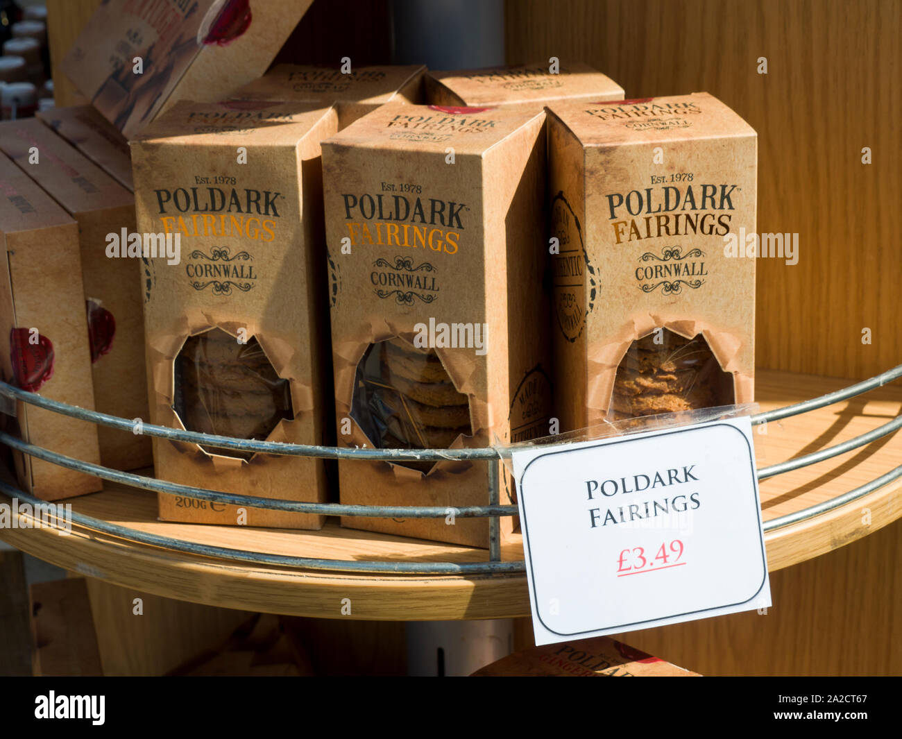 Cornish Fairings, traditional ginger biscuit being sold as Poldark merchandise, Charlestown Harbour, Cornwall, UK Stock Photo