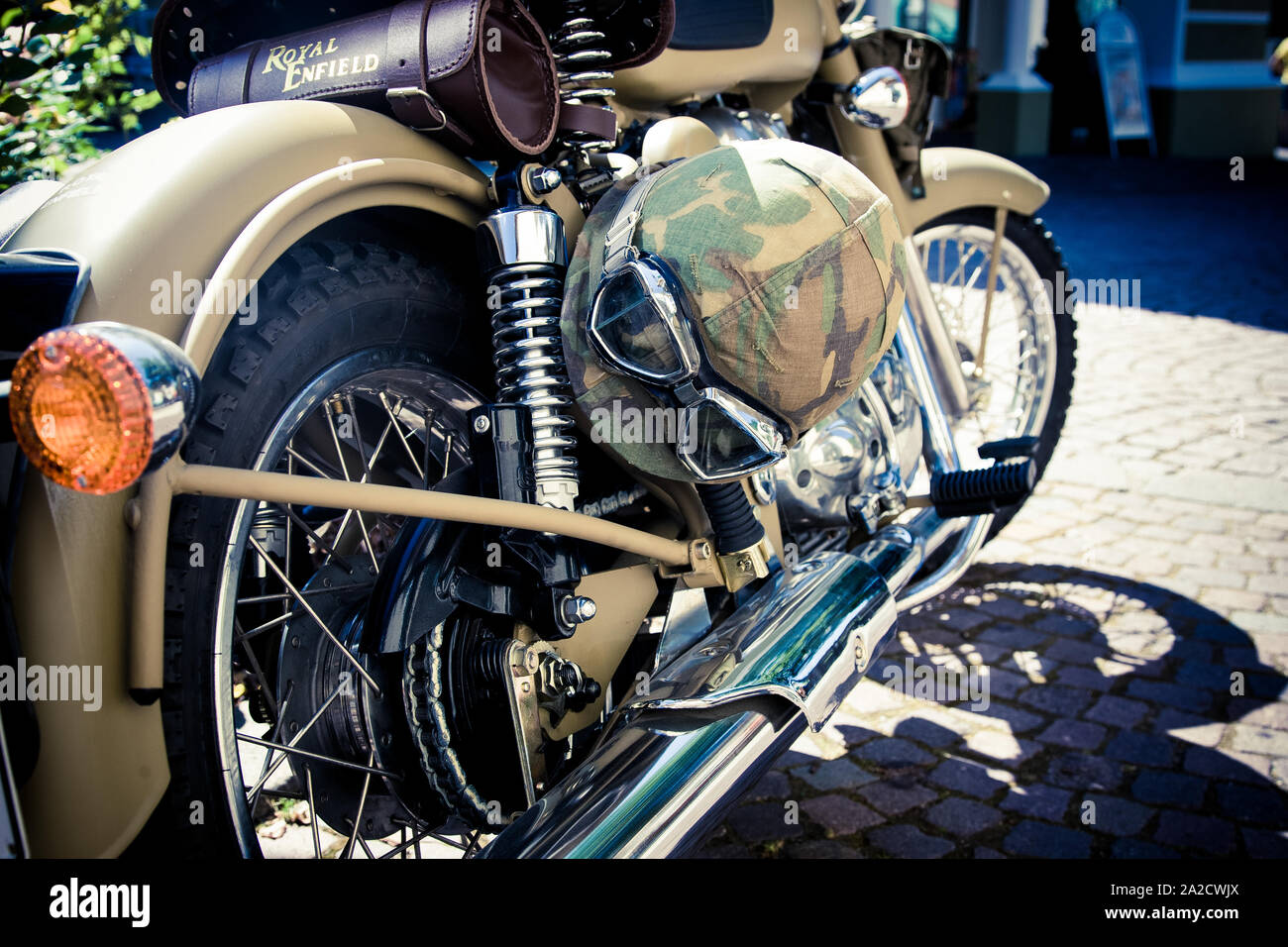 old vintage motorcycle with military helmet Stock Photo
