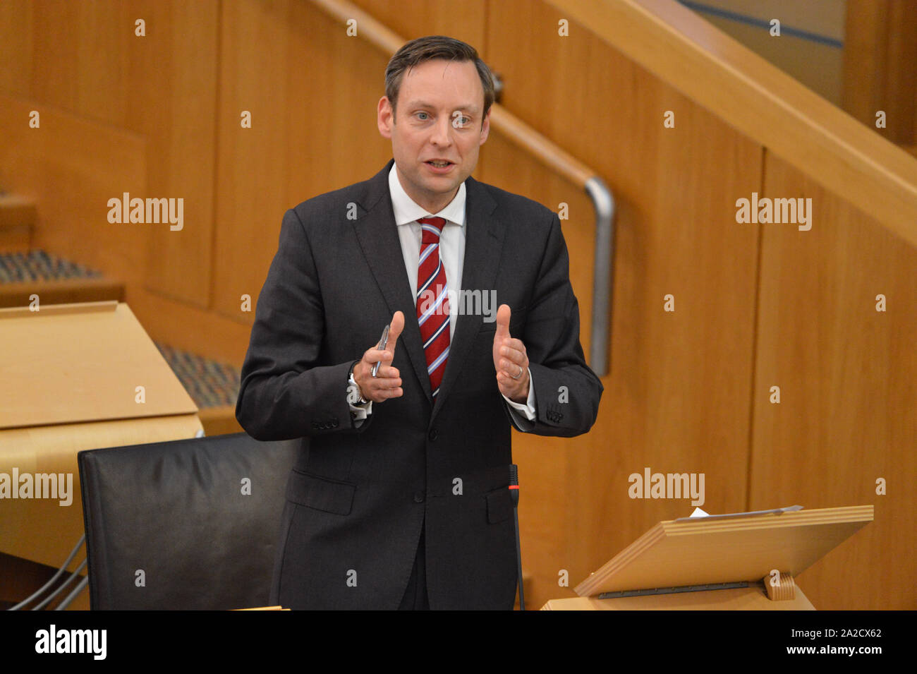 Edinburgh, 2 October 2019. Pictured: Liam Kier MSP - Depute Leader of the Scottish Conservative and Unionist Party. Afternoon debate in the chamber: Don't Extend the ScotRail Franchise.  Scottish Labour are wanting to replace the Dutch owned firm Abellio and nationalise ScotRail after its many failings from over crowding to cancelled trains.  Credit: Colin Fisher/Alamy Live News Stock Photo