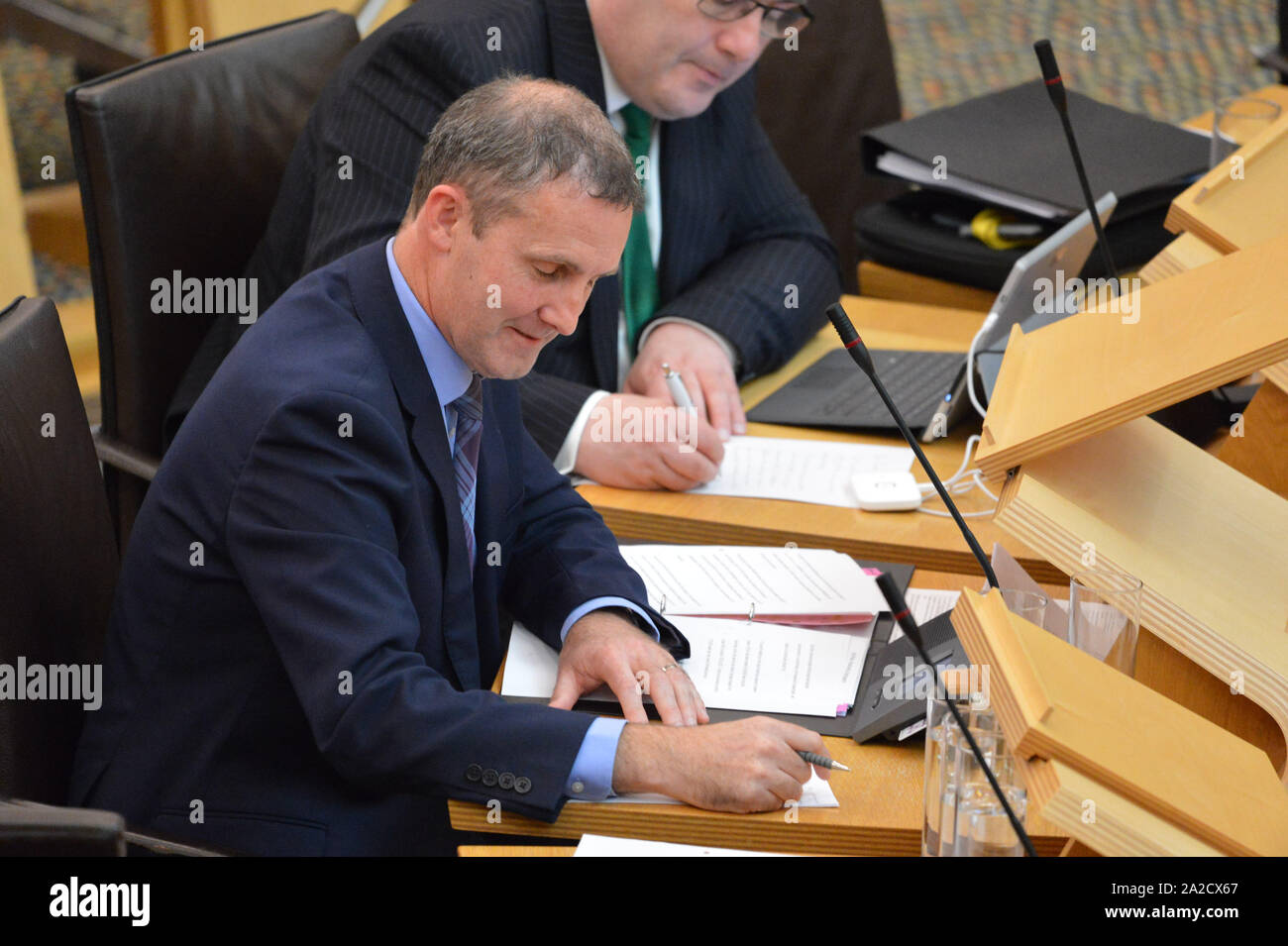 Edinburgh, 2 October 2019. Pictured: Michael Matheson MSP - Cabinet Secretary for Transport, Infrastructure and Connectivity for the Scottish National Party (SNP). Afternoon debate in the chamber: Don't Extend the ScotRail Franchise.  Scottish Labour are wanting to replace the Dutch owned firm Abellio and nationalise ScotRail after its many failings from over crowding to cancelled trains.  Credit: Colin Fisher/Alamy Live News Stock Photo