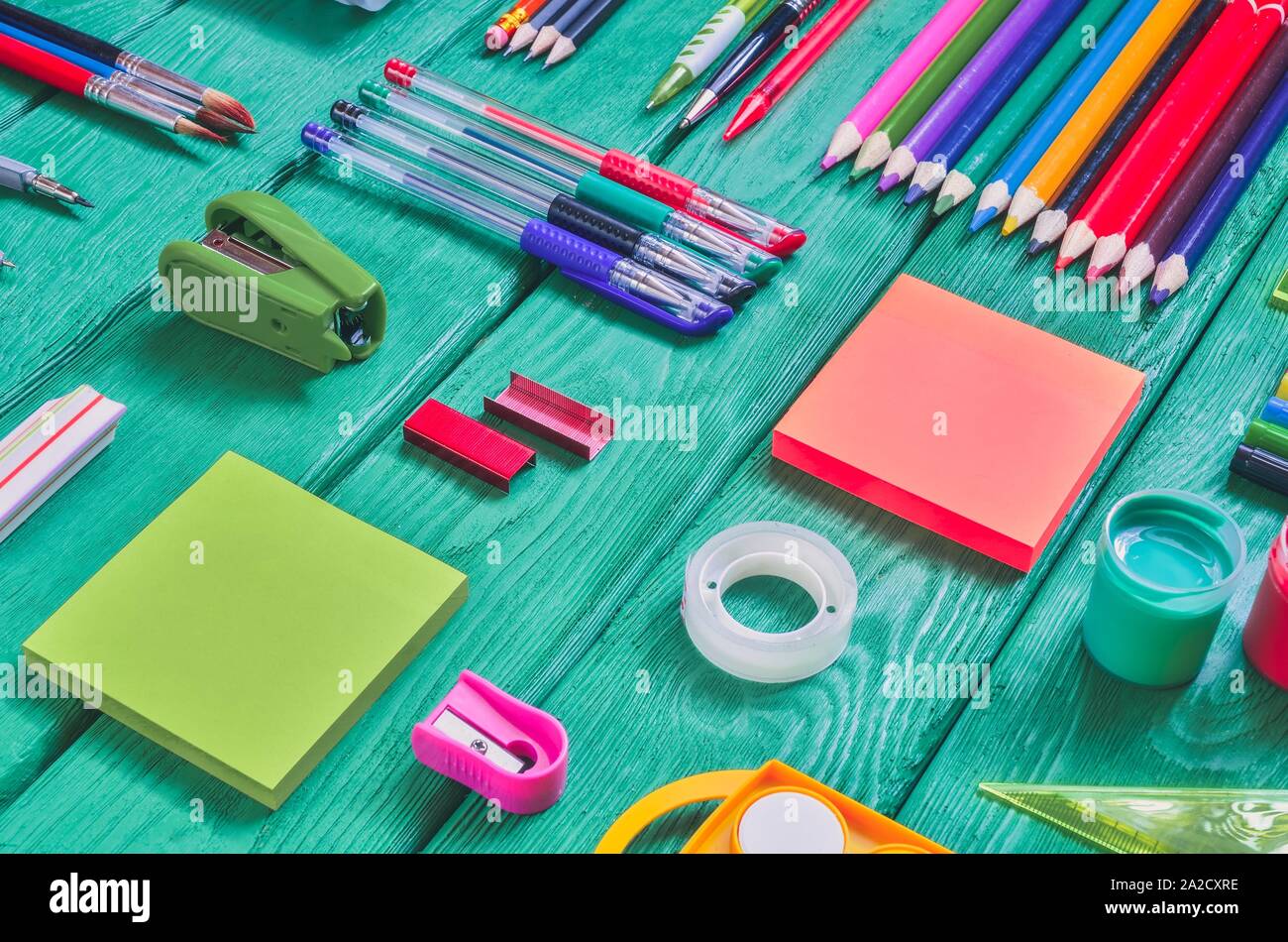 Creative School Concept Arranged School Accessories On A Green