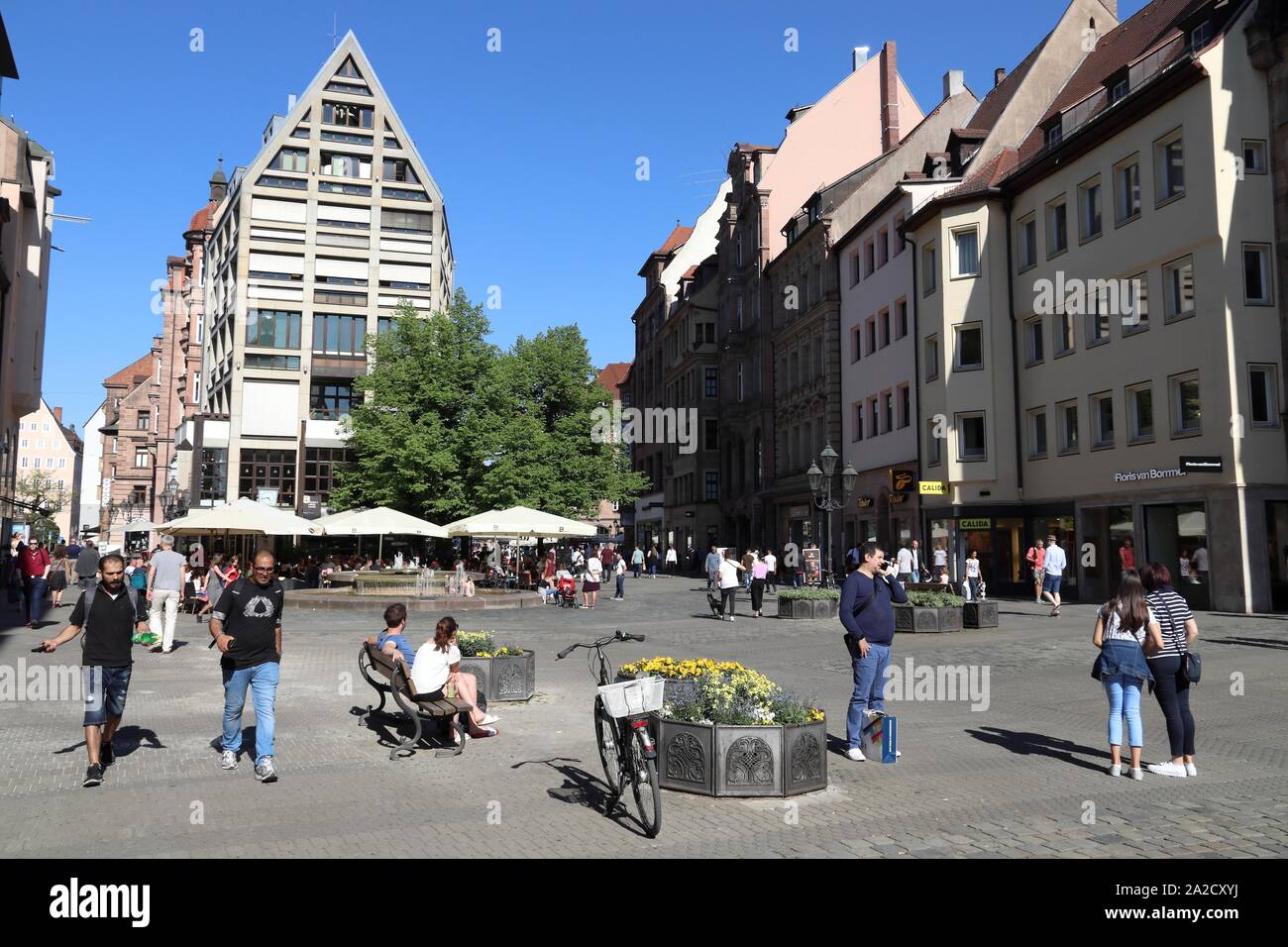 NUREMBERG, GERMANY - MAY 7, 2018: People visit Ludwigsplatz (Ludwig Square) shopping area in Nuremberg Old Town, Germany. Stock Photo