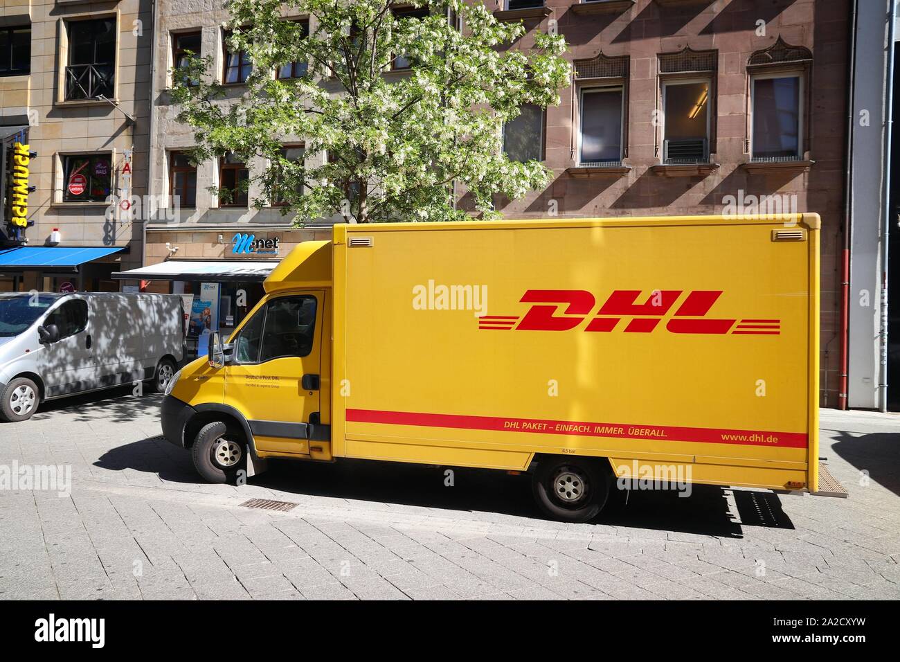 NUREMBERG, GERMANY - MAY 7, 2018: DHL courier delivery van in Germany. DHL  is part of German national mail service - Deutsche Post Stock Photo - Alamy