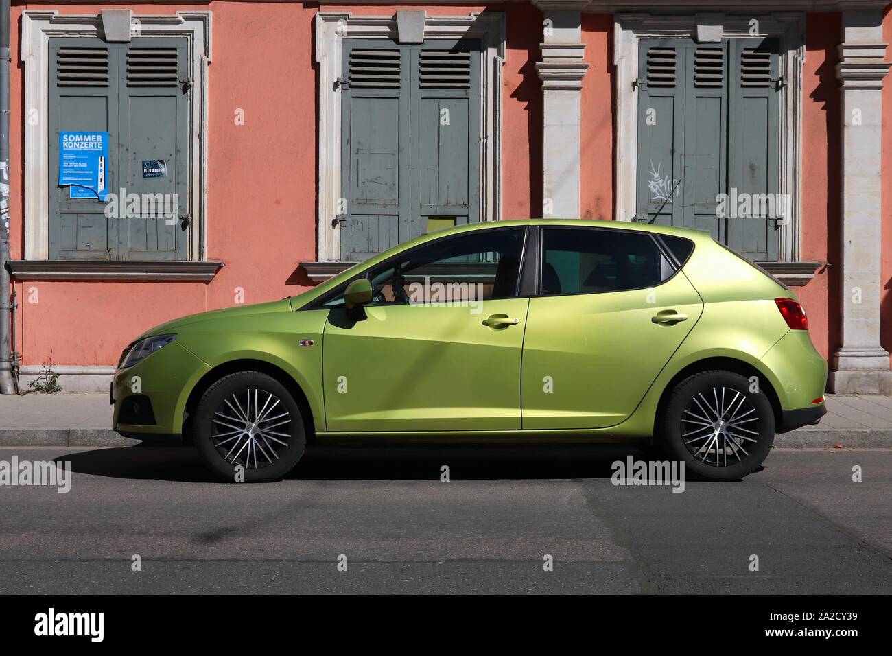 ERLANGEN, GERMANY - MAY 6, 2018: Green Seat Ibiza compact hatchback car parked in Germany. The car was designed by Belgian car designer Luc Donckerwol Stock Photo