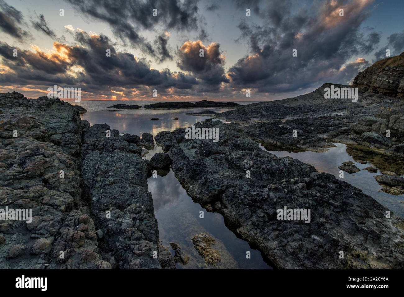 Beautiful seascape sea rock sunrise hi-res stock photography and images ...