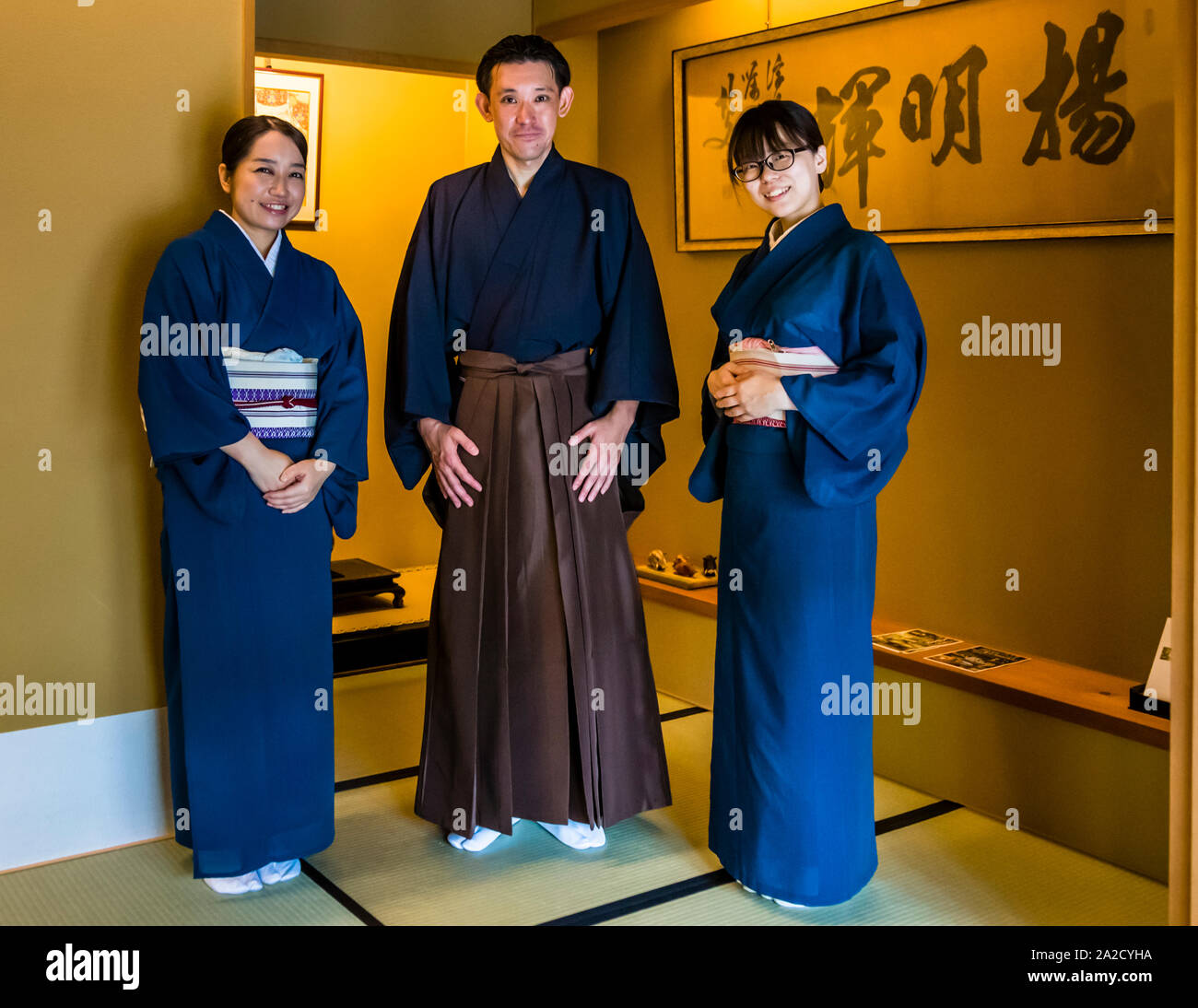 The service team at Fugetsuro in traditional dress. The house of the last shogun in Shizuoka City, is now the restaurant and guesthouse Fugetsuro. In the former residence of the last shogun Tokugawa Yoshinobu, you can reserve a table and be served some of his favorite dishes, such as black beans, egg dishes, rice with bonito flakes and fish. Stock Photo
