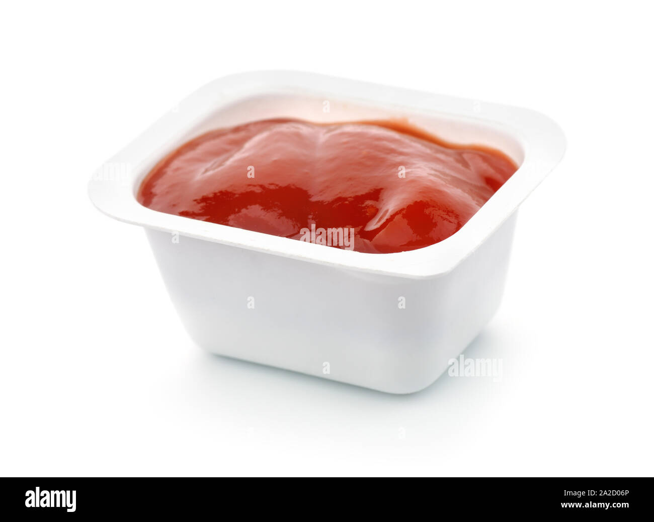 Plastic ketchup fast food dip packet isolated on white Stock Photo - Alamy