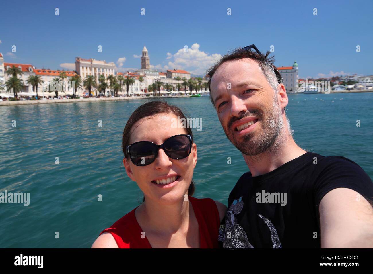 Croatia couple selfie with Split Old Town. Traveler selfie portrait. Stock Photo