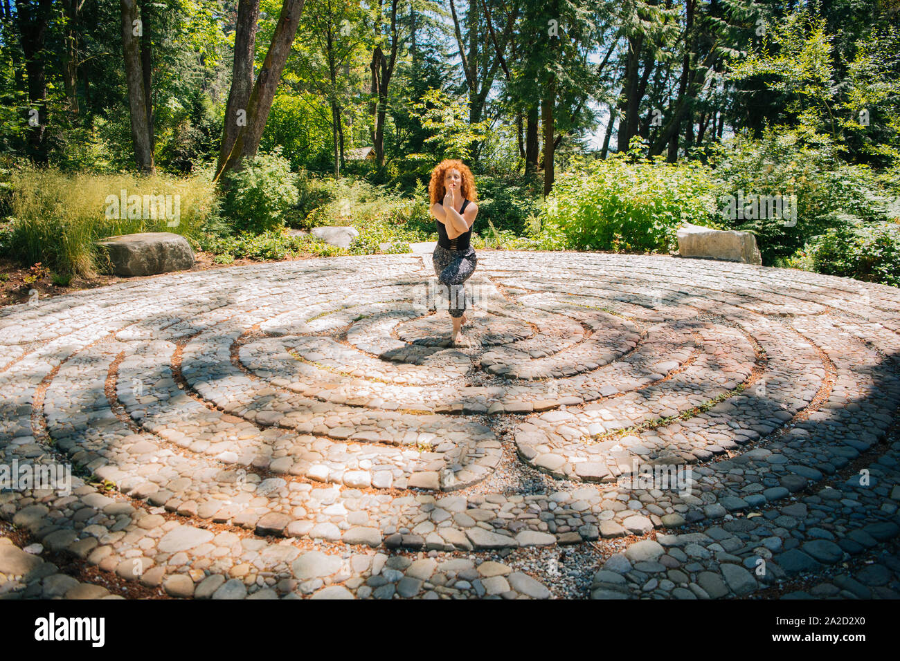 Woman doing yoga, Bainbridge Island, Washington, USA Stock Photo