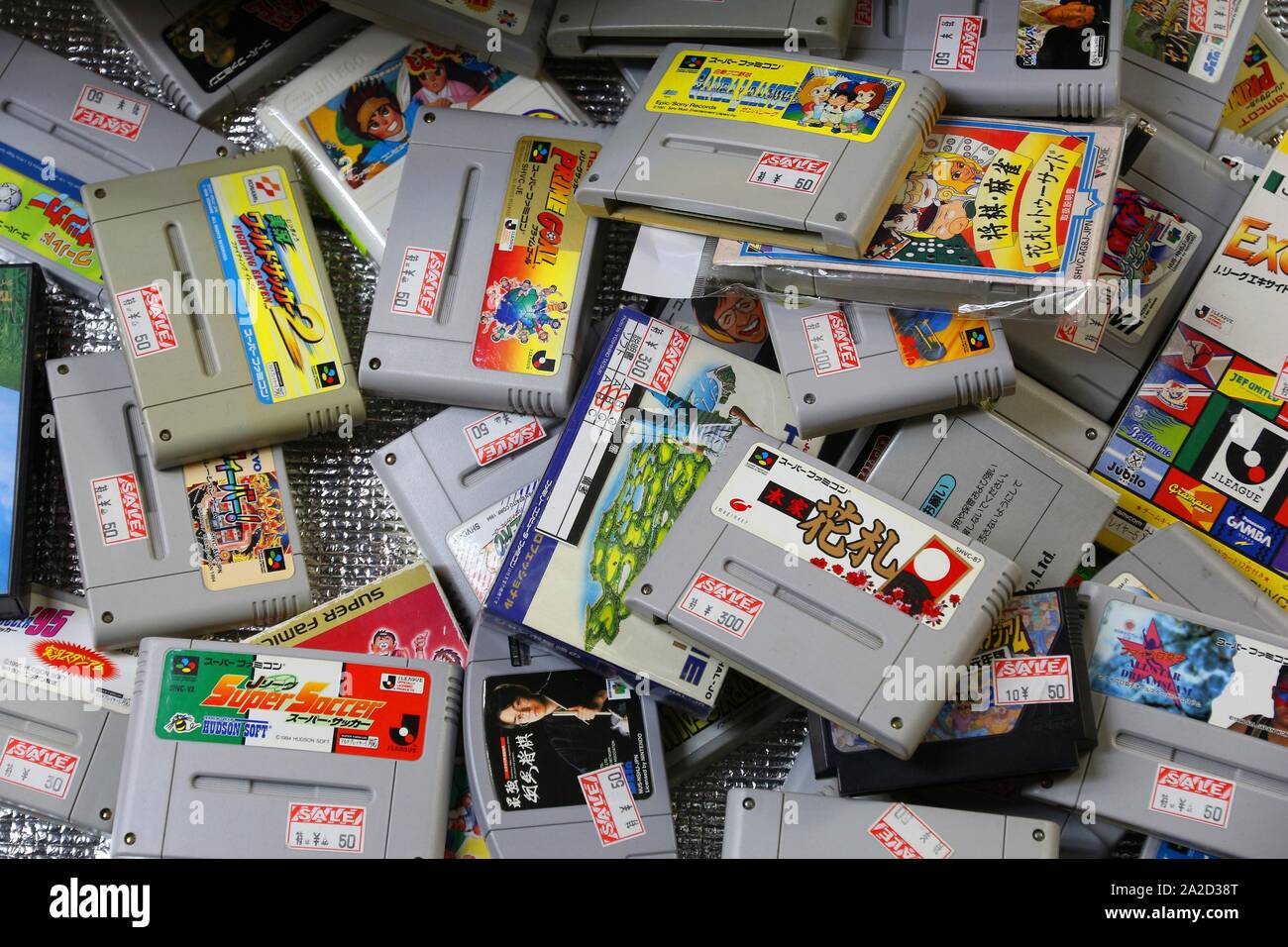 TOKYO, JAPAN - DECEMBER 4, 2016: Retro video game collectible store SNES bargain bin in Akihabara district of Tokyo, Japan. Akihabara Electric Distric Stock Photo