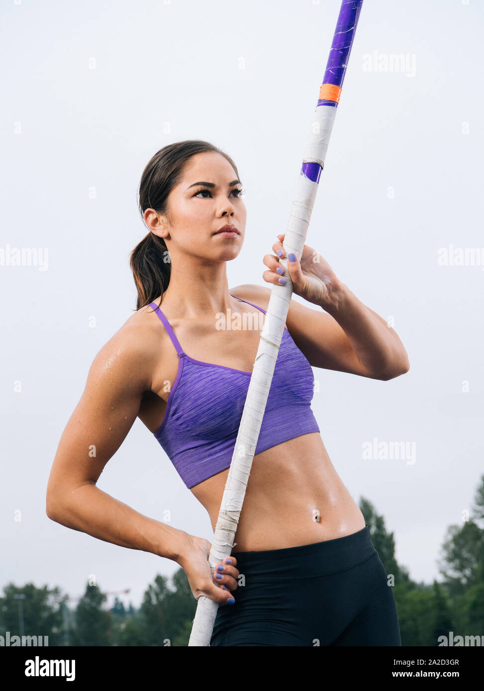 View of young woman pole jumper Stock Photo