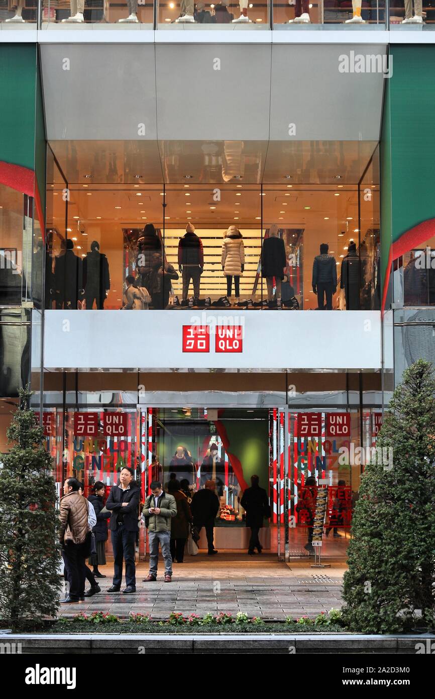 TOKYO, JAPAN - DECEMBER 1, 2016: People walk by Uniqlo fashion store in  Ginza district of Tokyo, Japan. Ginza is a legendary shopping area in Chuo  War Stock Photo - Alamy