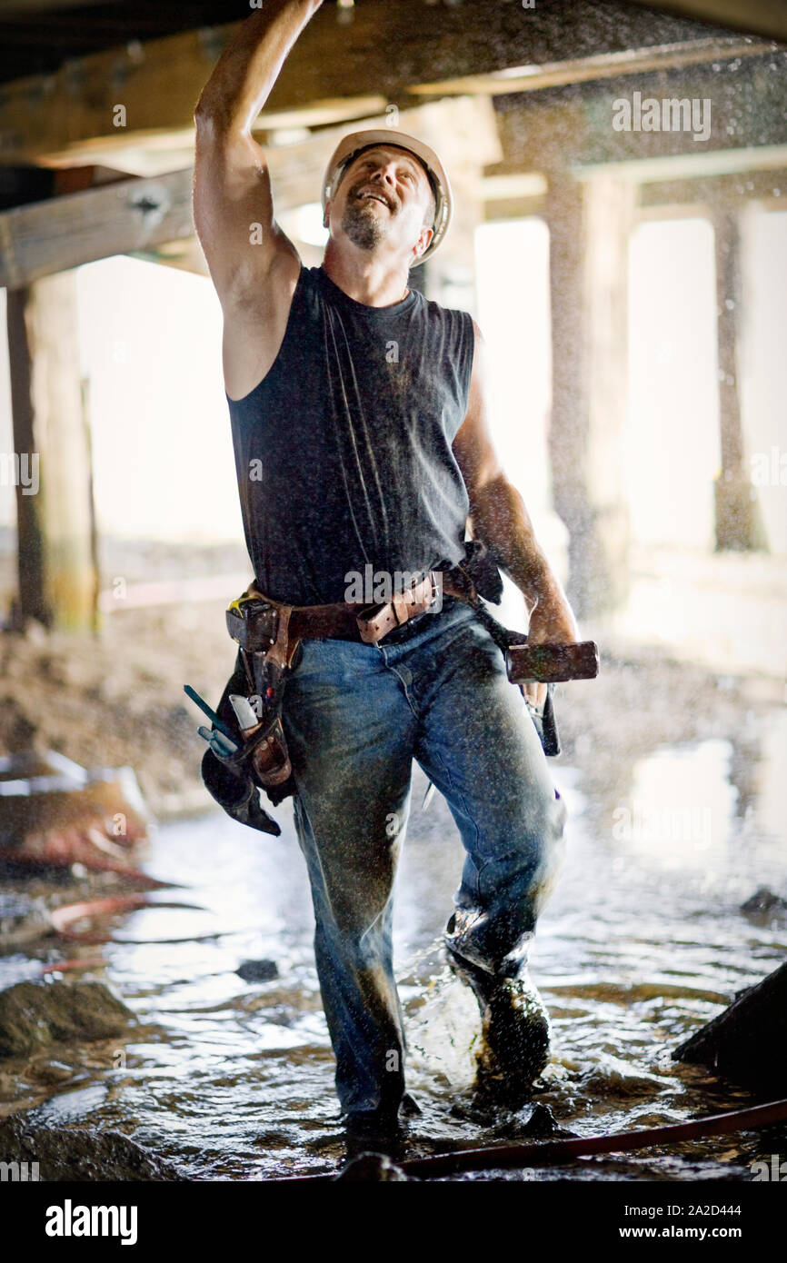 Mature male construction worker standing in a building site Stock Photo ...