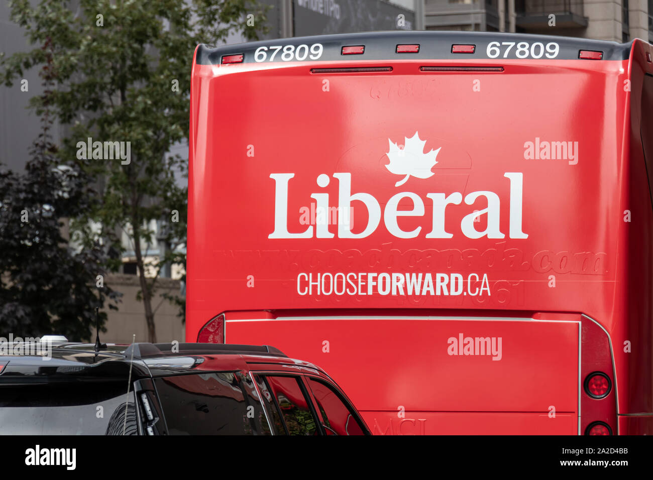 Liberal Party of Canada logo on a campaign bus while at campaign stop in downtown Toronto. Stock Photo