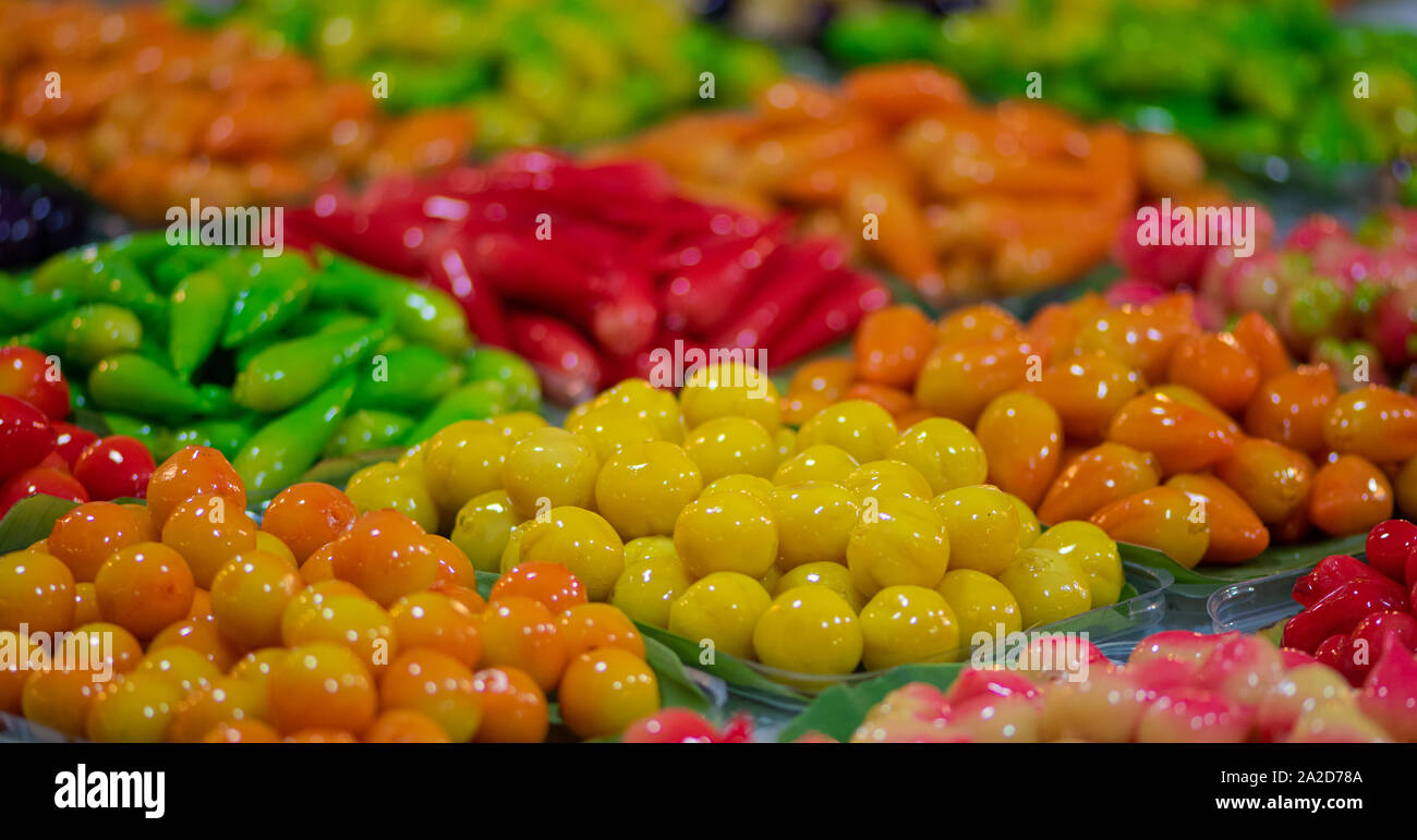 Close up of colourful Luk chup traditional Thai desert sweets candy Stock Photo