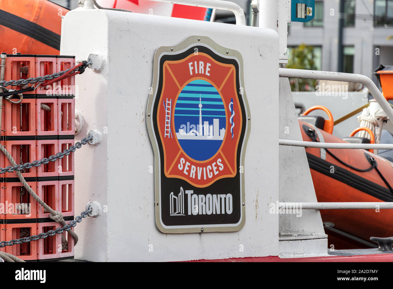 Toronto Fire Services logo on the side a fire rescue boat docked at port. Stock Photo