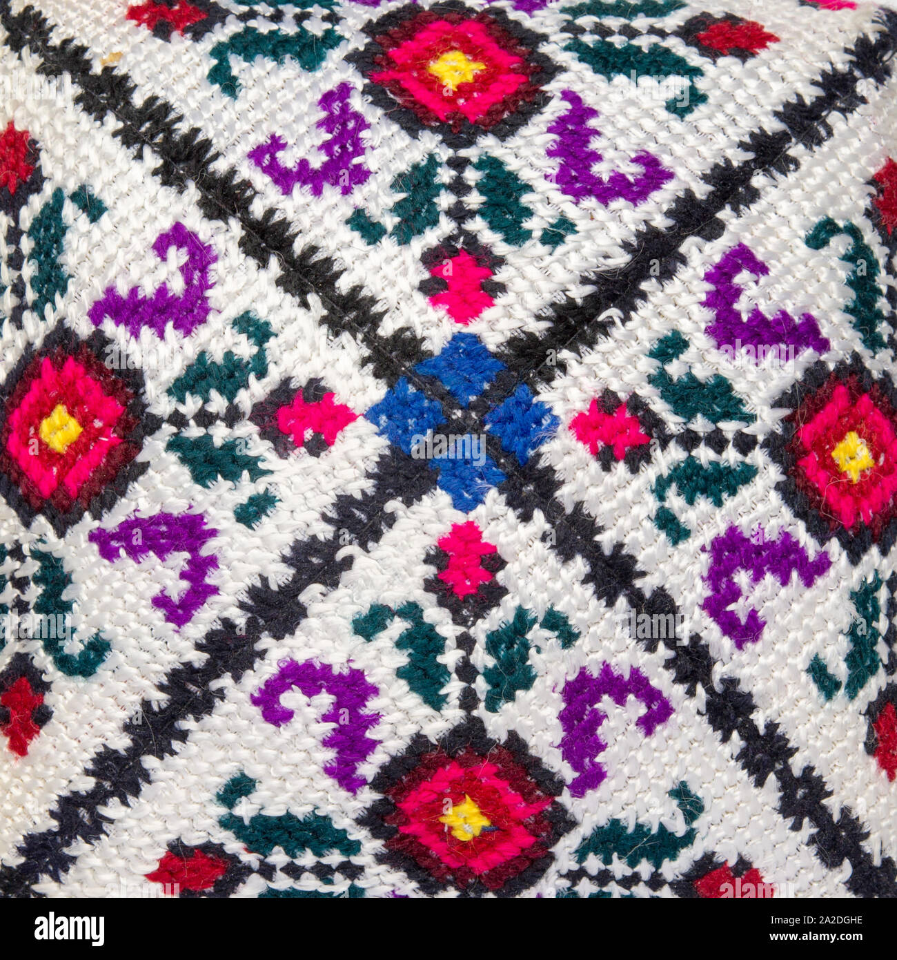 Handmade patterns on fabric. East style. Stock Photo
