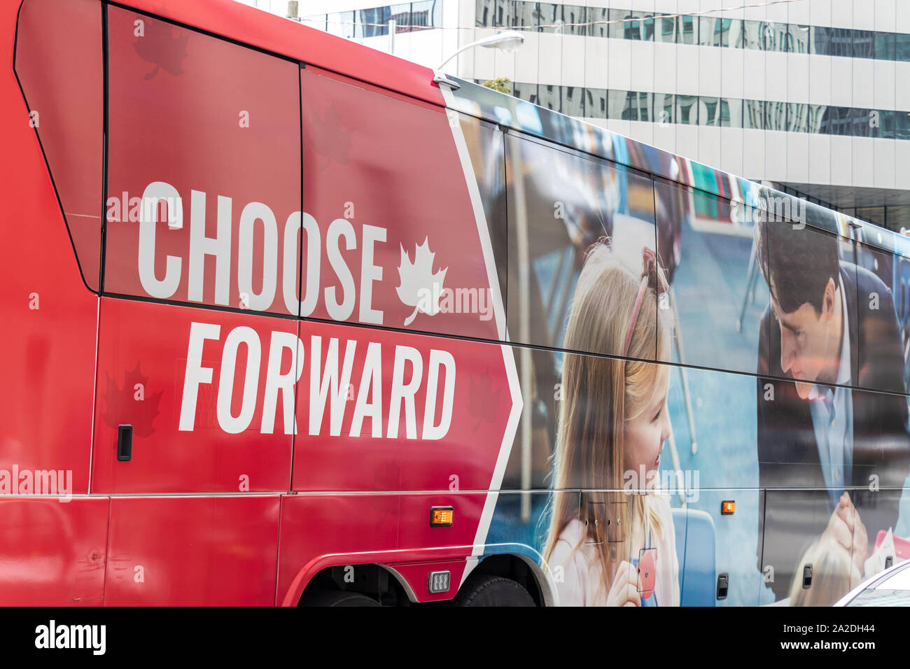 Liberal Party of Canada campaign slogan “Choose Forward” and picture of PM Justin Trudeau on a campaign bus while at stop in downtown Toronto. Stock Photo