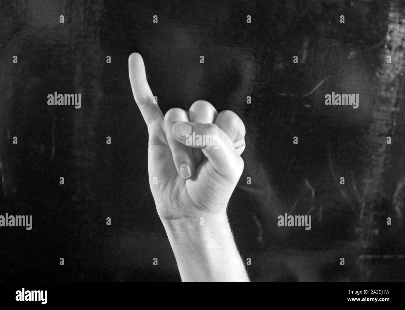 Der Buchstabe J in der Fingersprache. Letter J in finger alphabet. Stock Photo