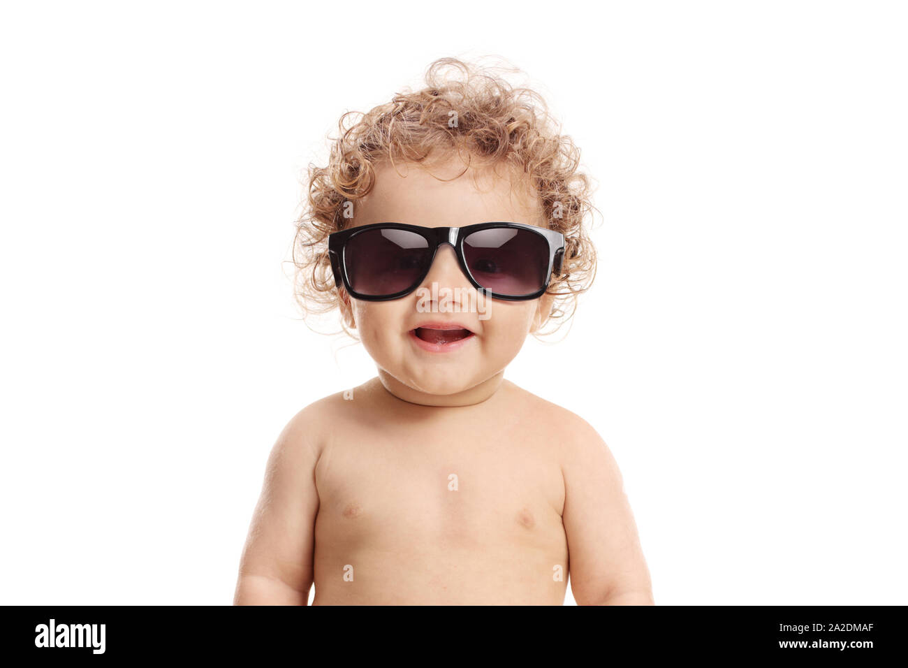 Baby boy wearing a pair of sunglasses isolated on white background Stock Photo