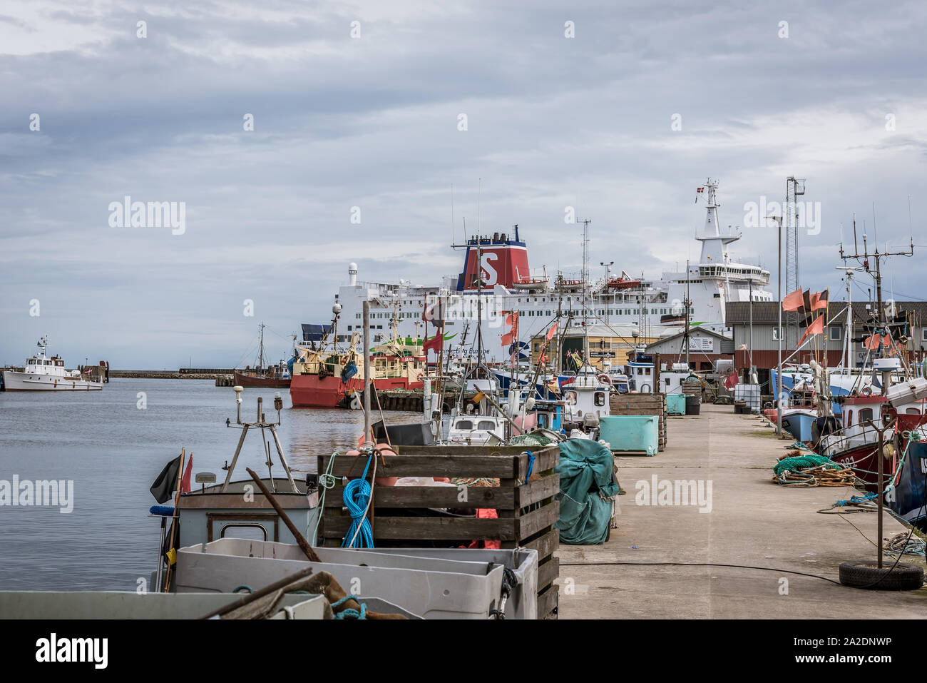 The car ferry Stena Nautika and fishing boats at the jetty of Grenaa, Denmark, September 6, 2019 Stock Photo