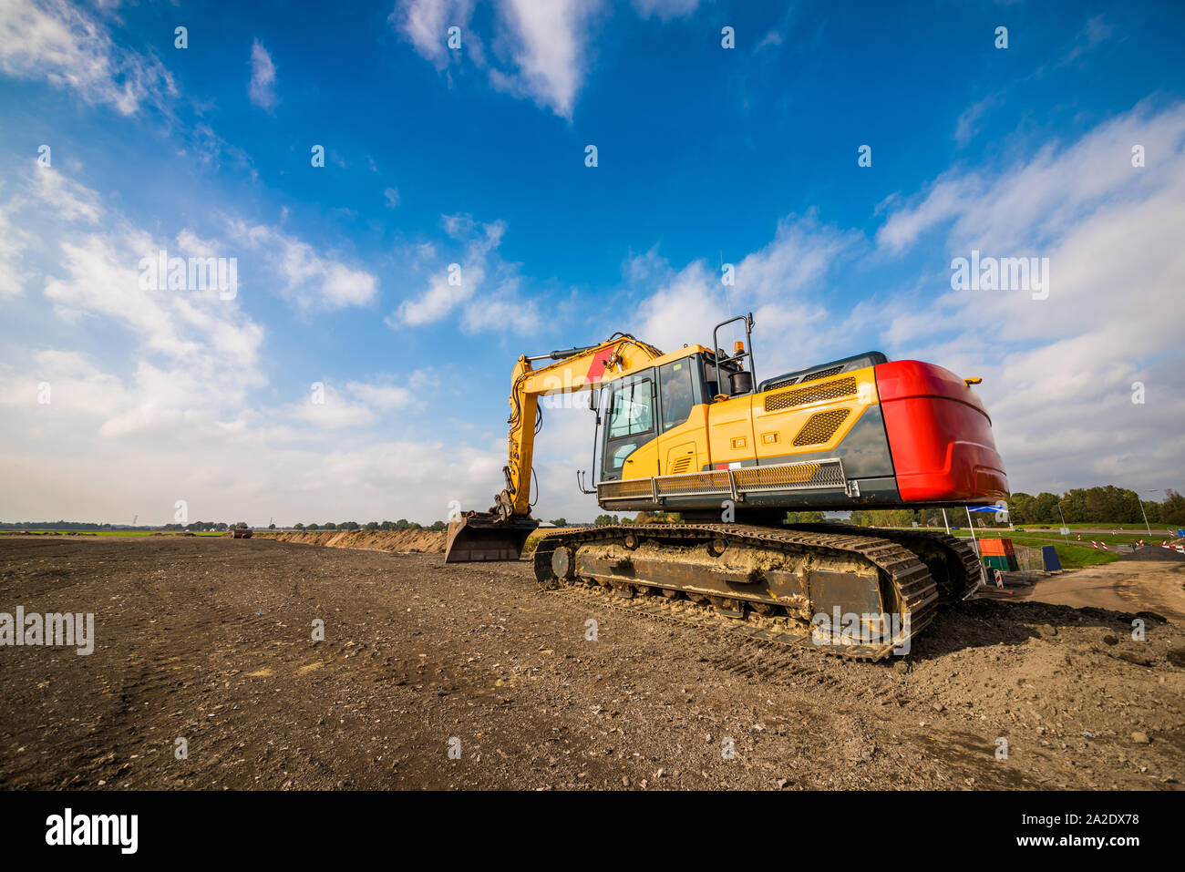 Big excavator in construction site Stock Photo