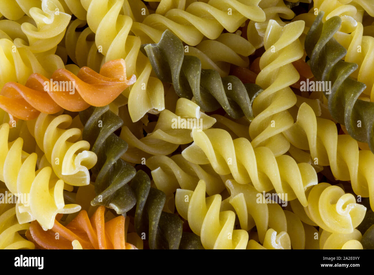 Download Uncooked Green And Yellow Fusilli Pasta Close Up Stock Photo Alamy Yellowimages Mockups