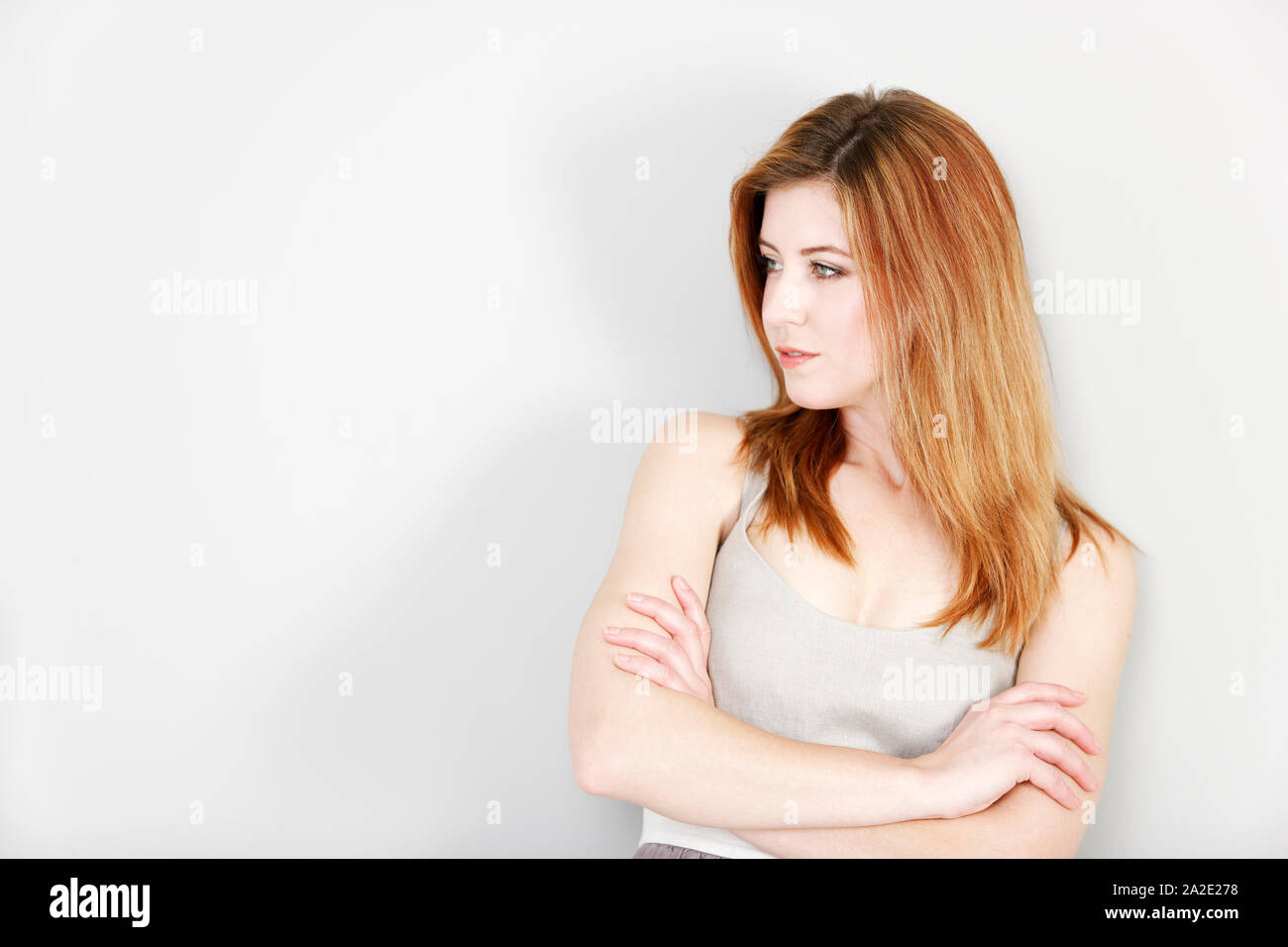 Stern woman arms crossed hi-res stock photography and images - Alamy