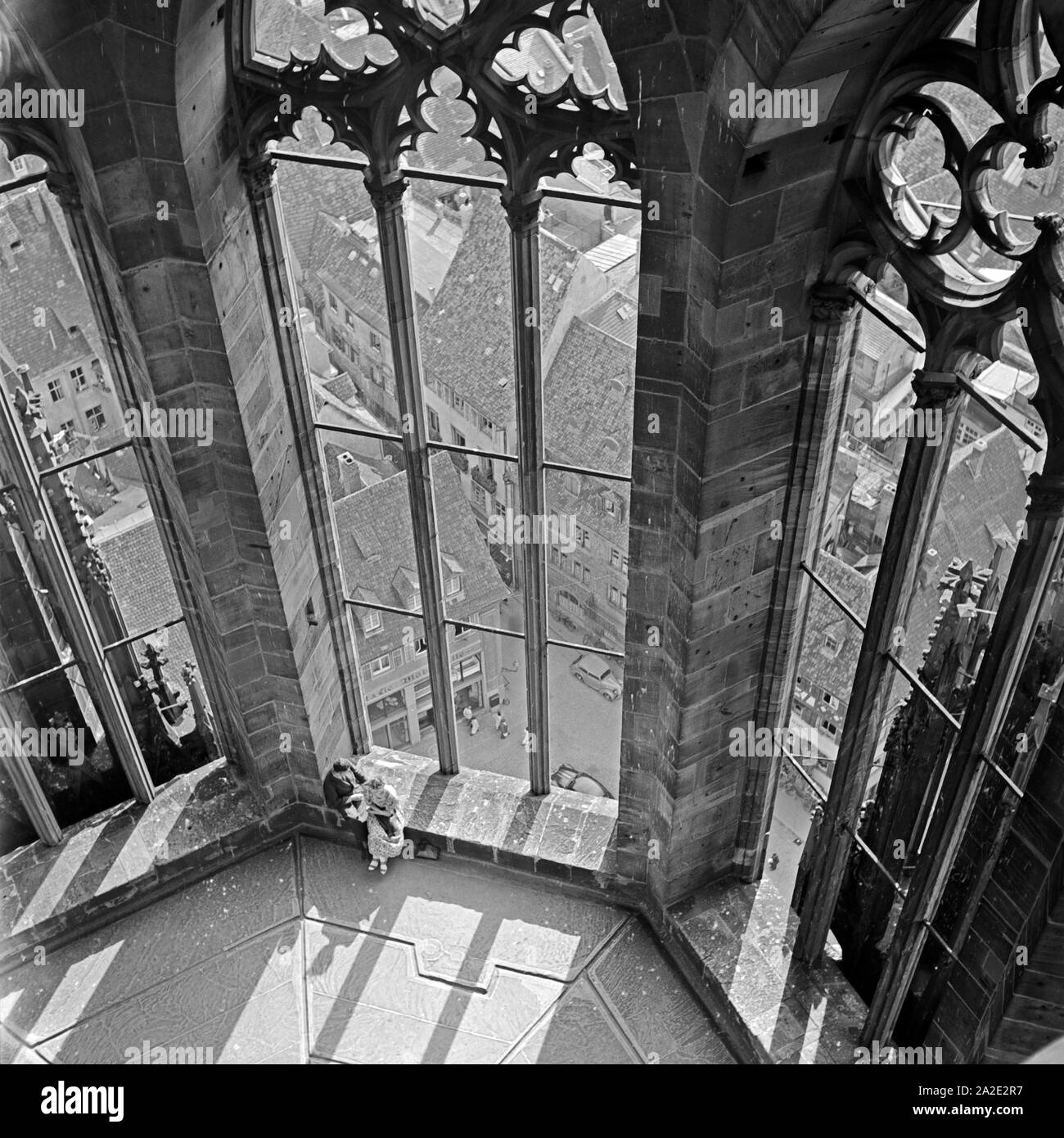 Im Turm des Münsters zu Freiburg, Deutschland 1930er Jahre. On the belfry of the Freiburg minster, Germany 1930s. Stock Photo