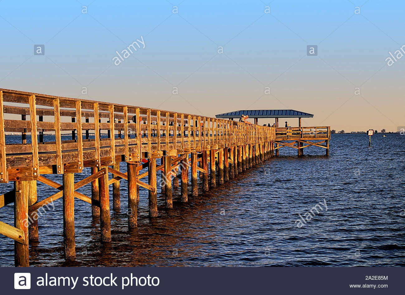 Marina Park Fishing Pier. Boardwalk located south of Safety Harbor, facing Tampa Bay. Photo taken at sunset Stock Photo