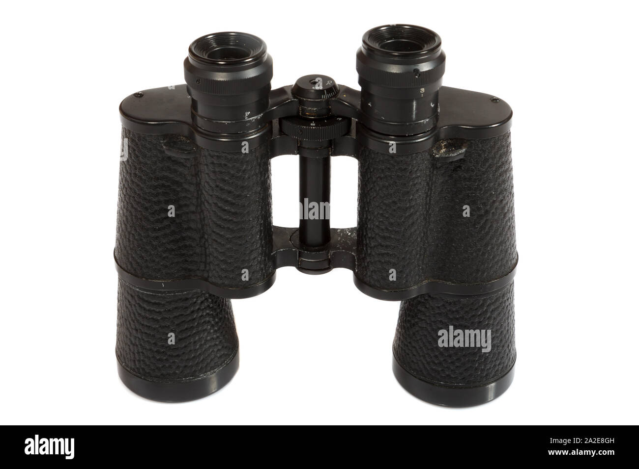 Black binoculars on white background. Stock Photo