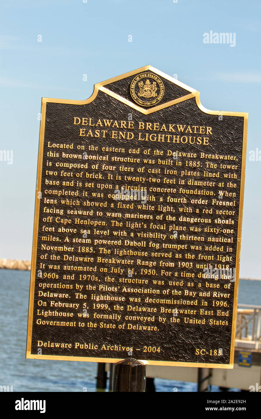 Lewes, Delaware - September 27, 2019 :  Historical marker describing the Delaware Breakwater East End Lighhouse in Delaware Bay. Stock Photo