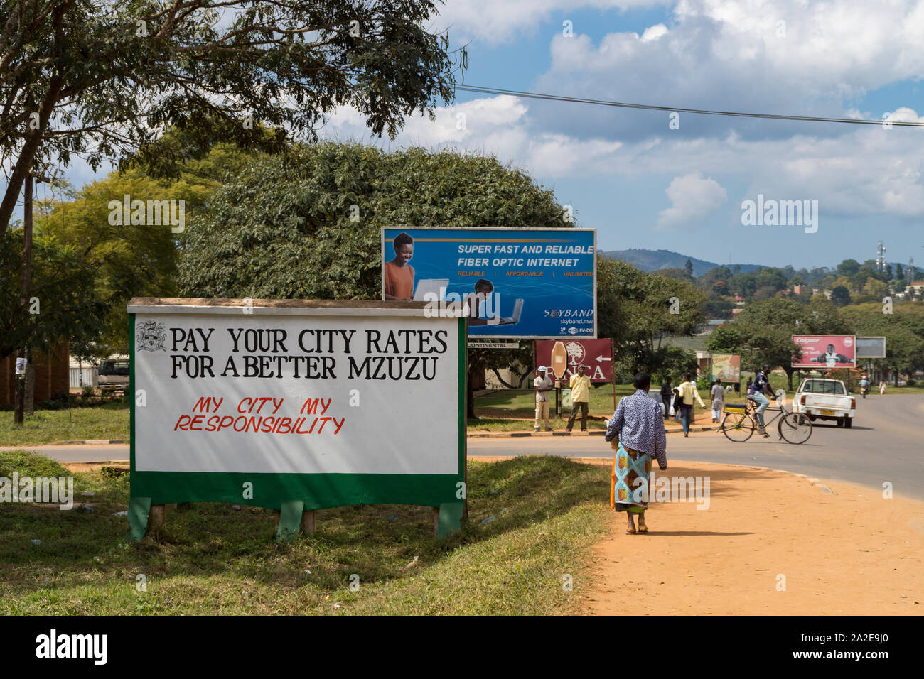 Road sign - pay your rates in Mzuzu, Malawi Stock Photo