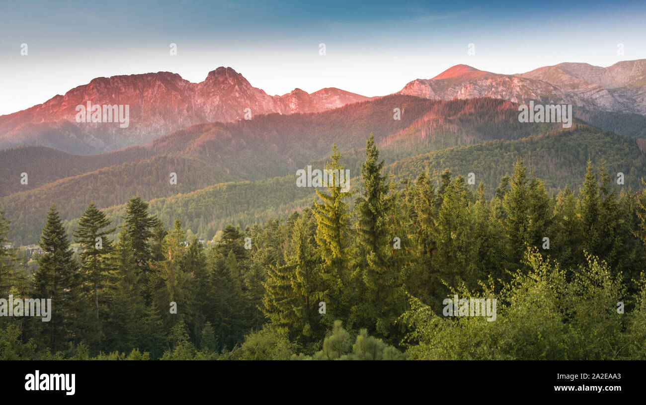 Sunset in Tatra Mountains - red rocky summits: Giewont, Siwy Kocioł, Wielka Turnia Stock Photo
