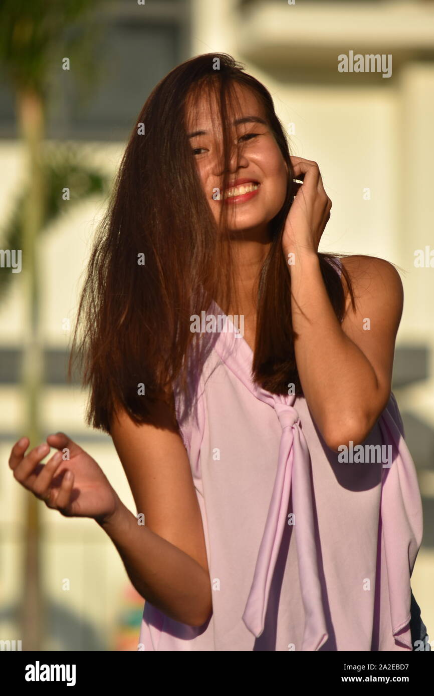 Beautiful Asian Adult Female Having Fun Stock Photo