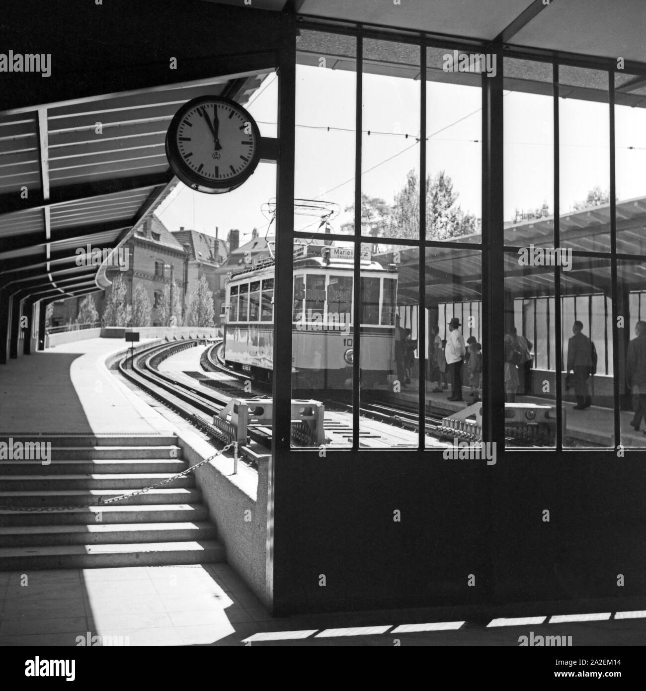 Passengers wait train Black and White