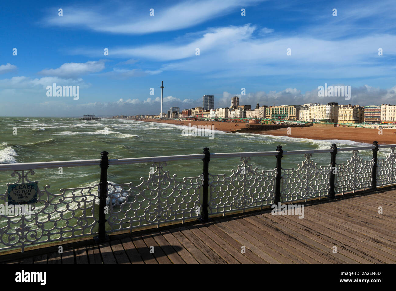 Views of the beach and seafront from Brighton Palace Pier, commonly known as Brighton Pier or the Palace Pier in Brighton, Sussex, England. Stock Photo