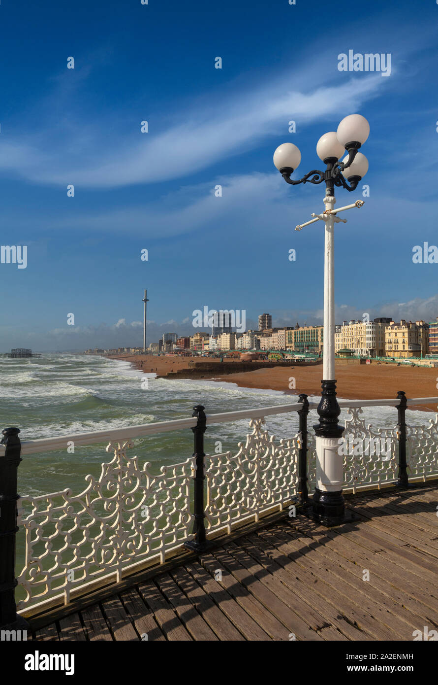 Views of the beach from Brighton Palace Pier, commonly known as Brighton Pier or the Palace Pier in Brighton, Sussex, England. Opened in 1899, it was Stock Photo