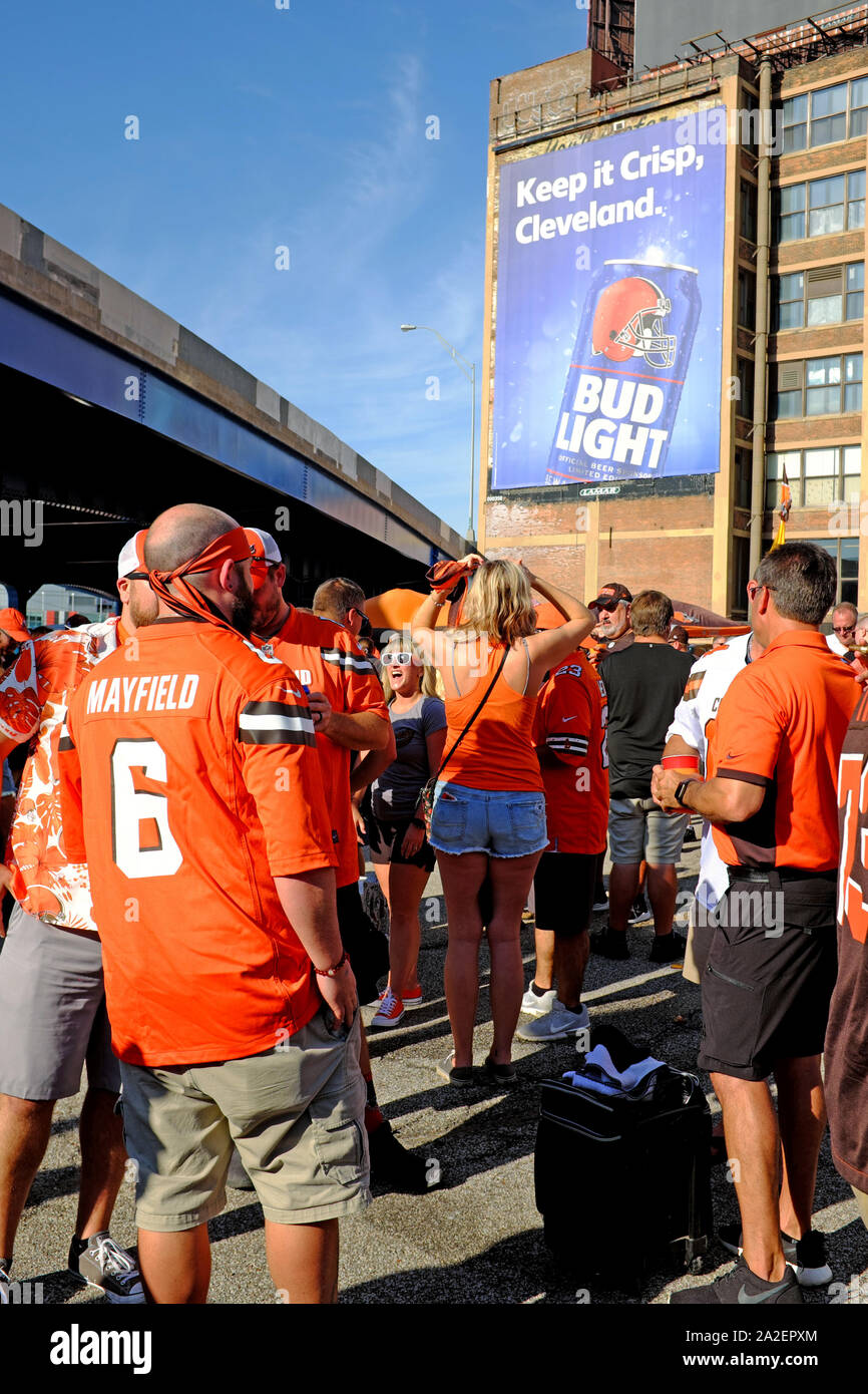 Cleveland Browns football fans enjoy pre-game tailgating parties in downtown Cleveland, Ohio, USA. Stock Photo