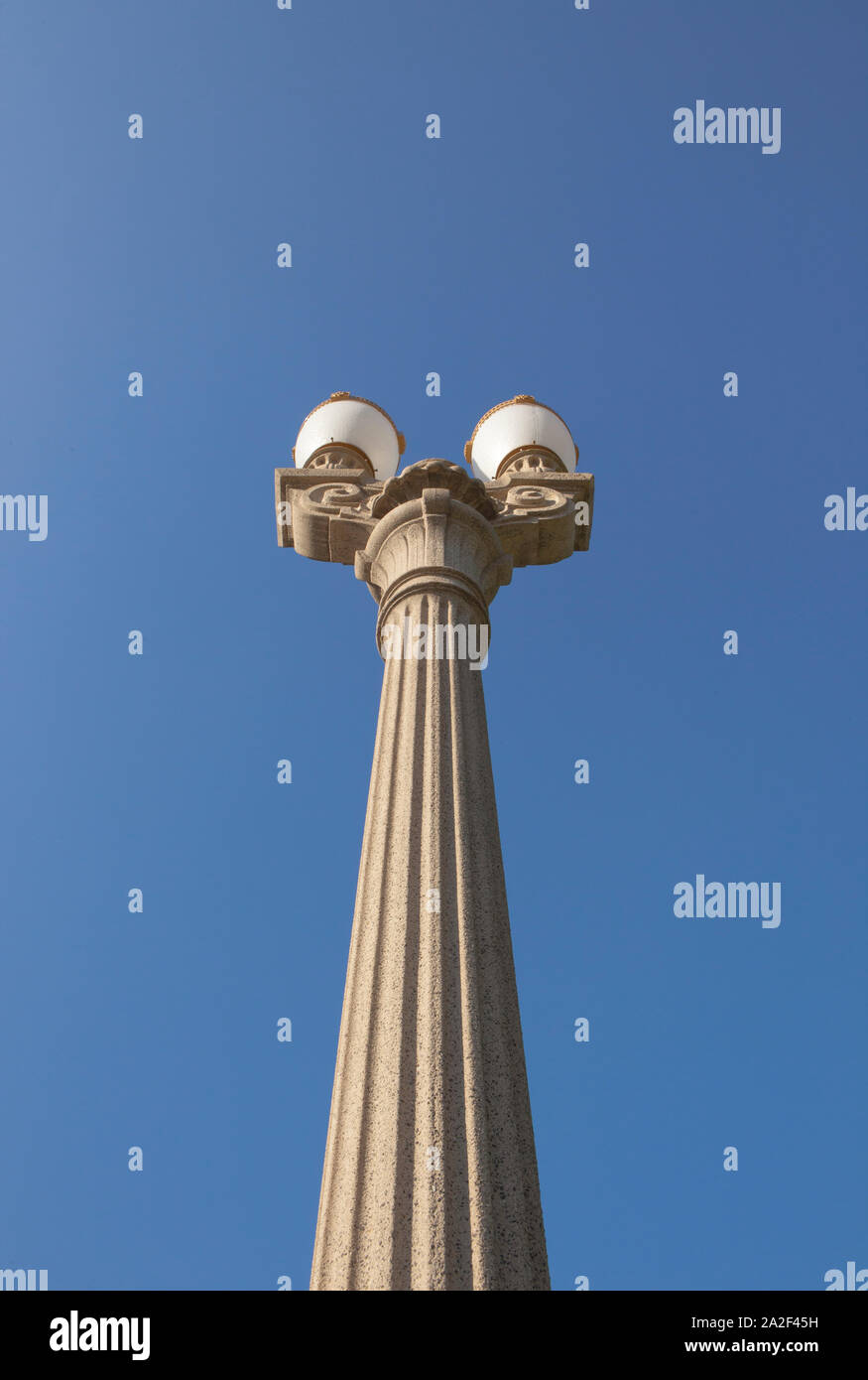 A perspective view of an old concrete street lamp Stock Photo - Alamy