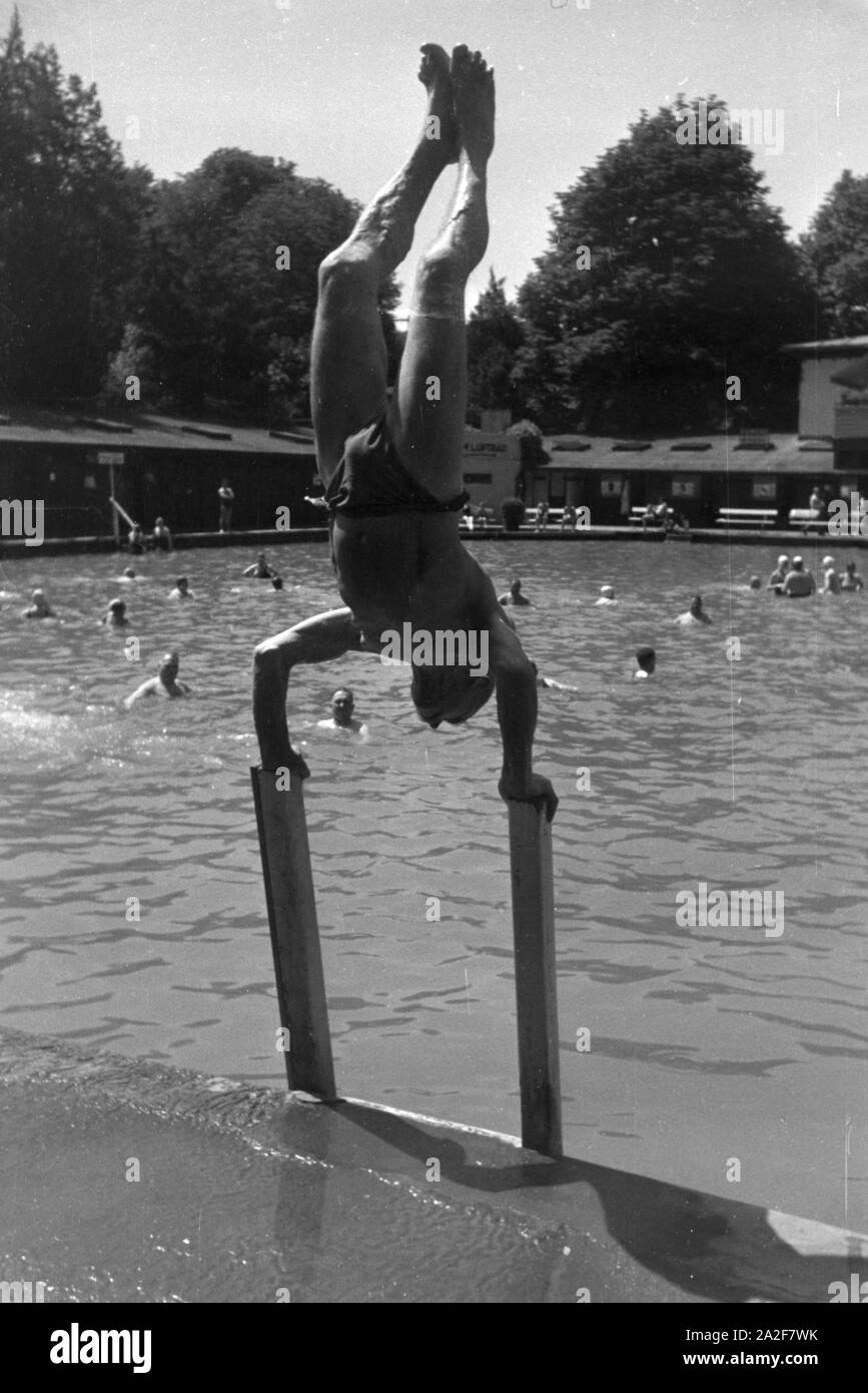 Swimmer swimmers swimming bather bathers bathing Black and White Stock ...