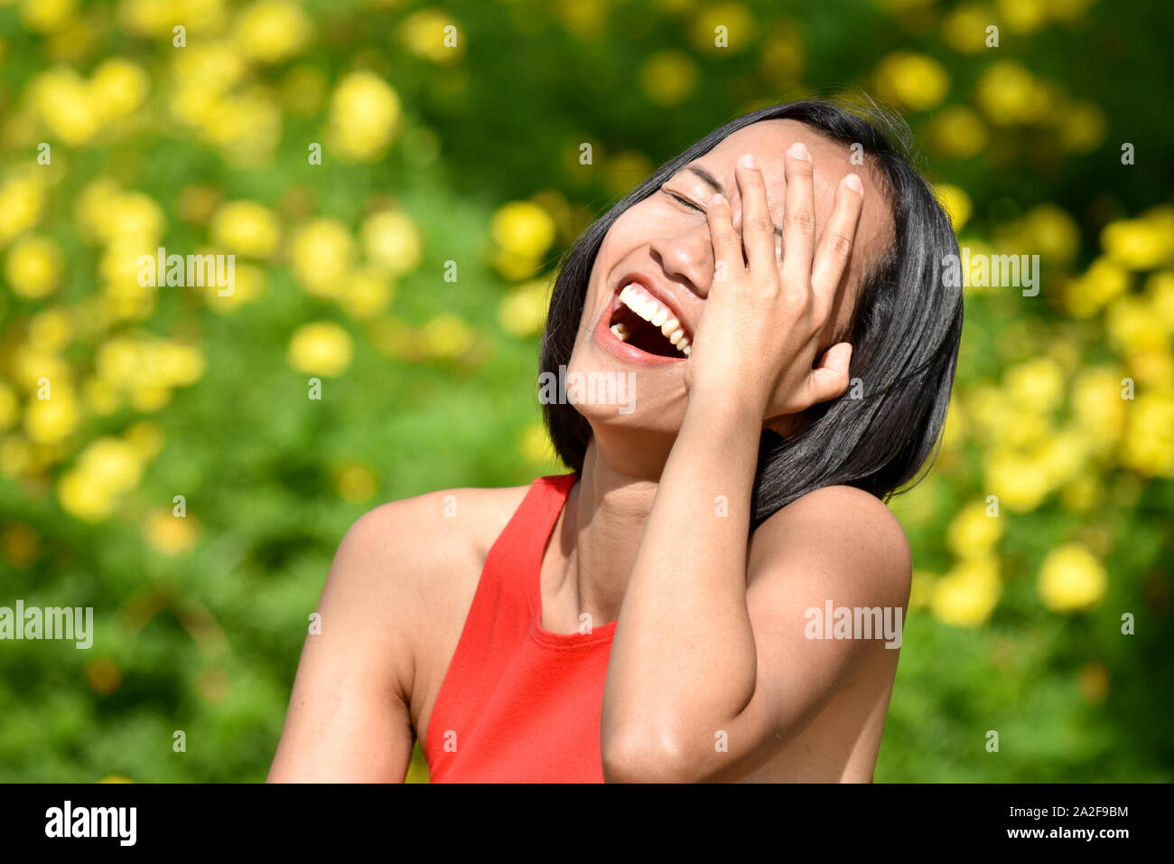 A Minority Female Laughing Stock Photo