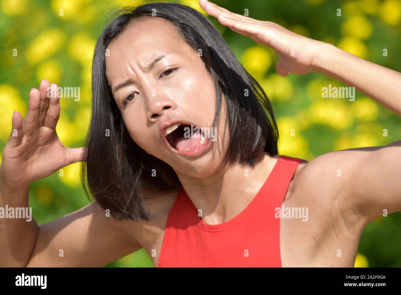 A Woman Making Funny Faces Stock Photo