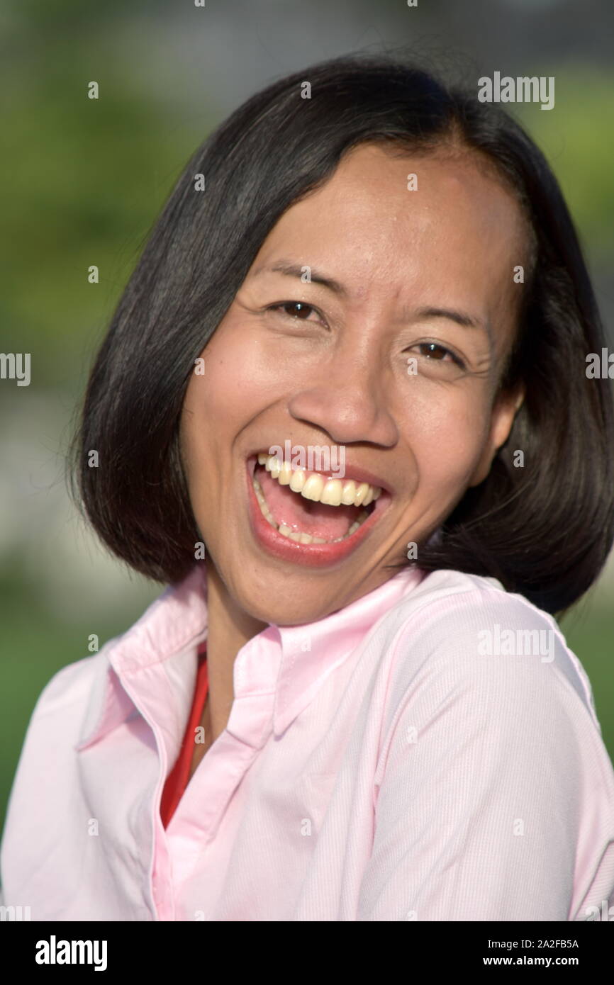 A Young Female Smiling Stock Photo