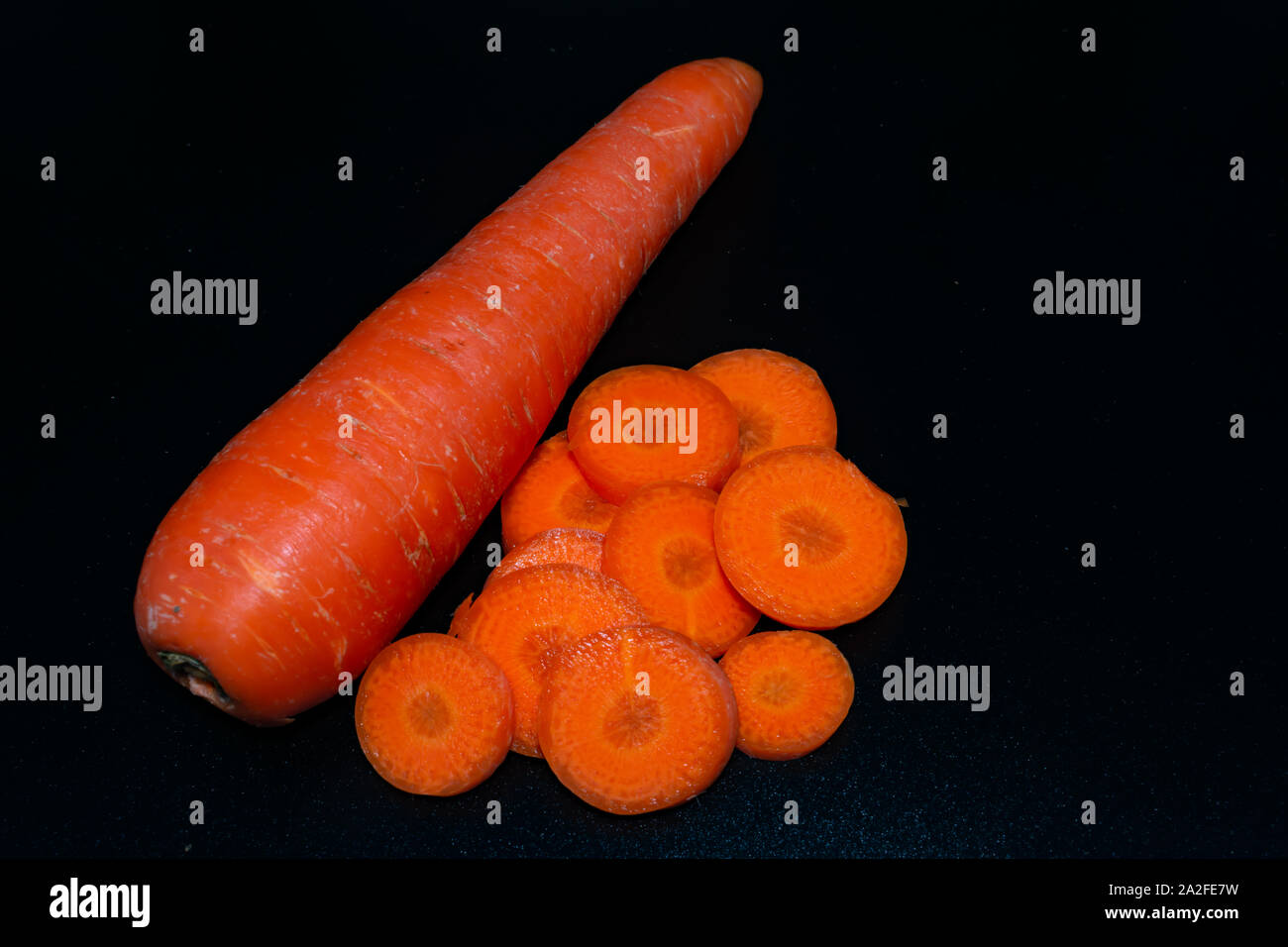 the carrot is rich in beta carotene Stock Photo