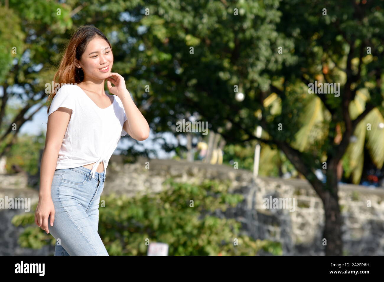 Happy beautiful young asian woman hi-res stock photography and images ...