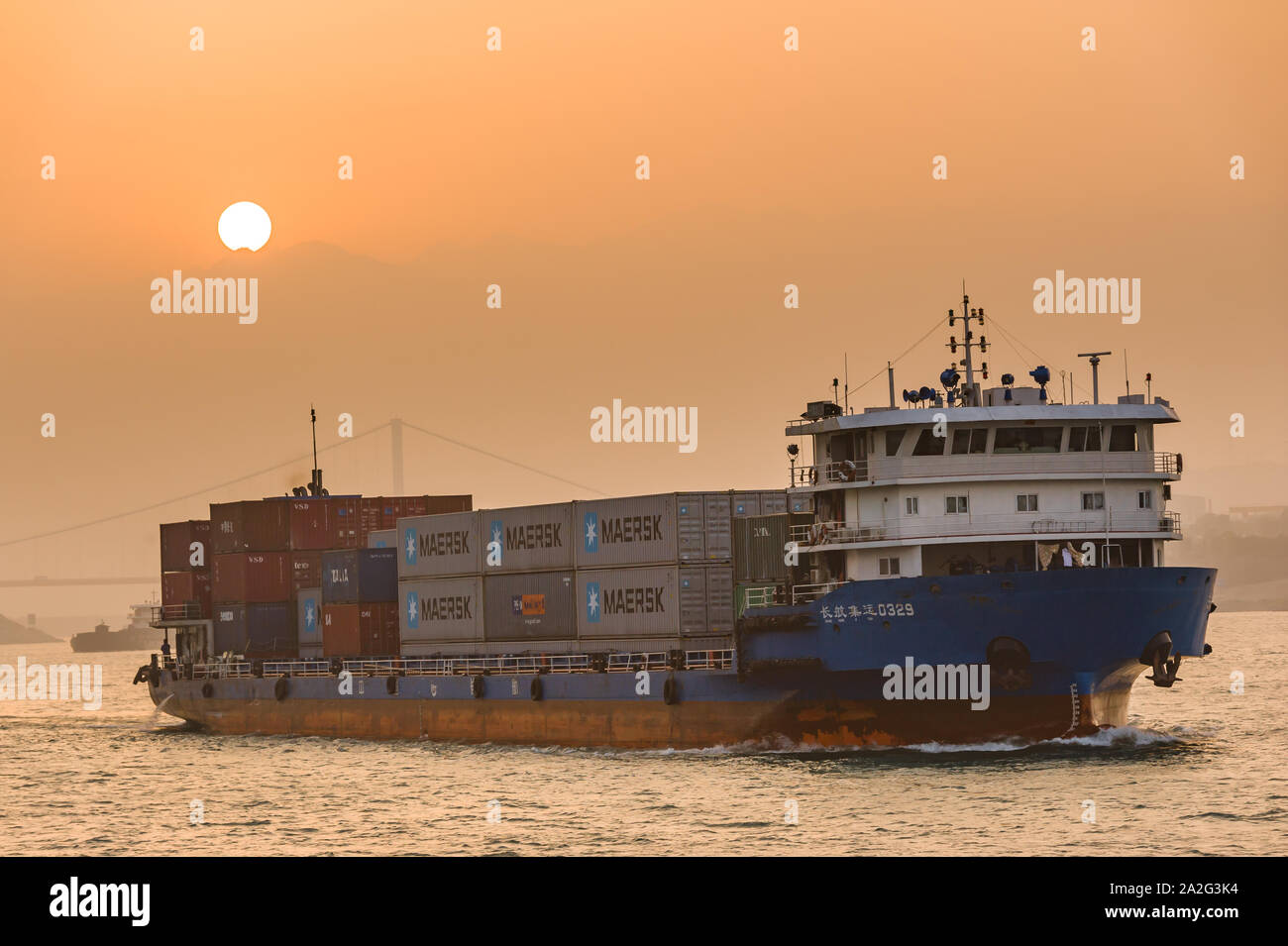 Container ship sea sunset hi-res stock photography and images - Alamy