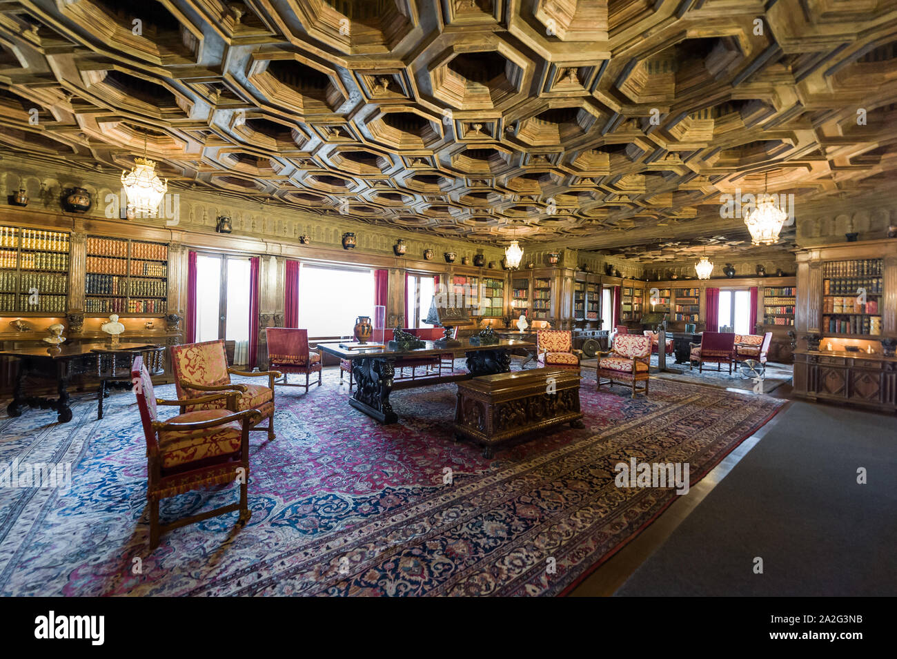California, USA, 09 Jun 2013: Grand study room with attached library at Hearst Castle, which is a National and California Historical Landmark opened f Stock Photo